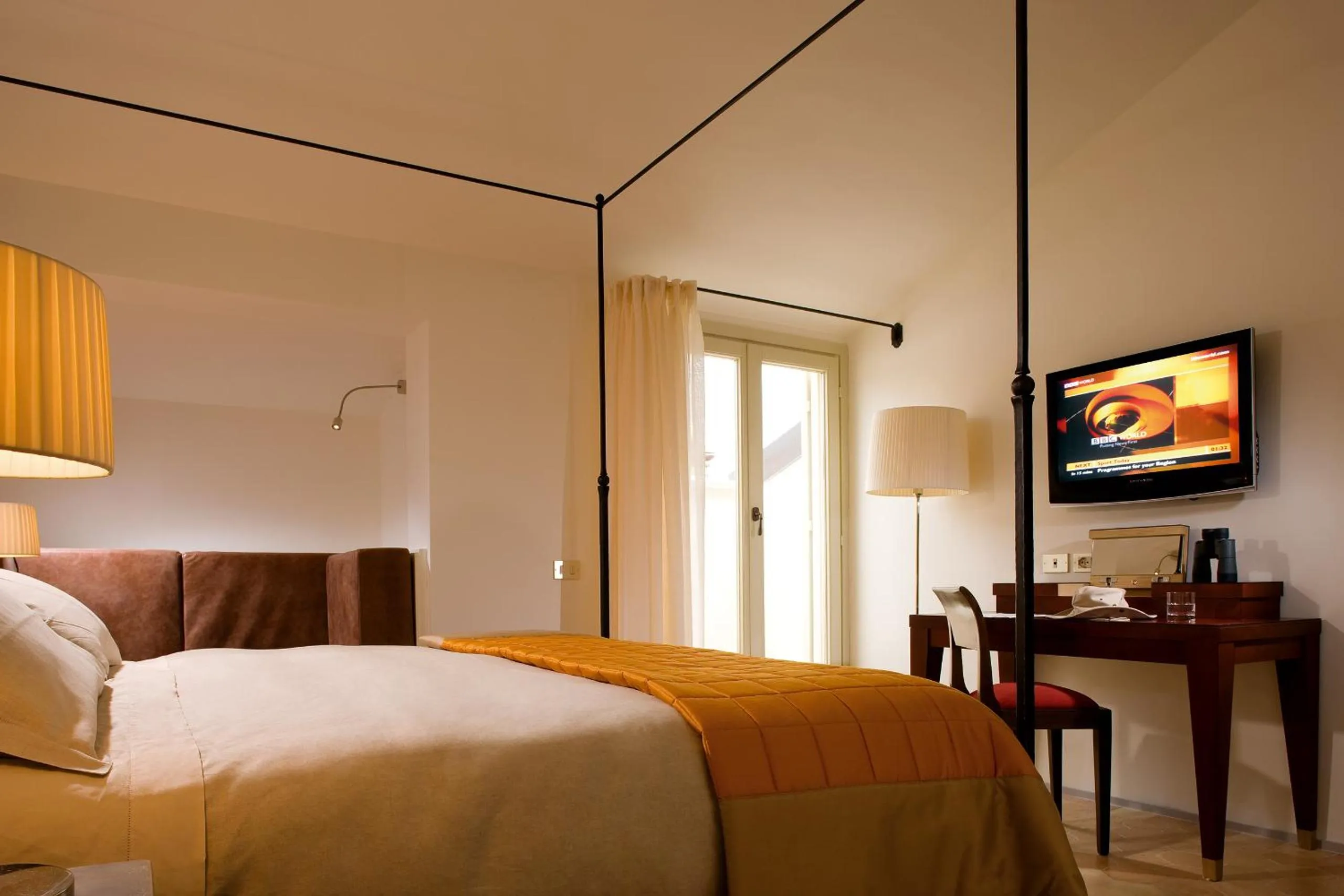 Photo of the whole room, Bed in Relais & Chateaux Palazzo Seneca