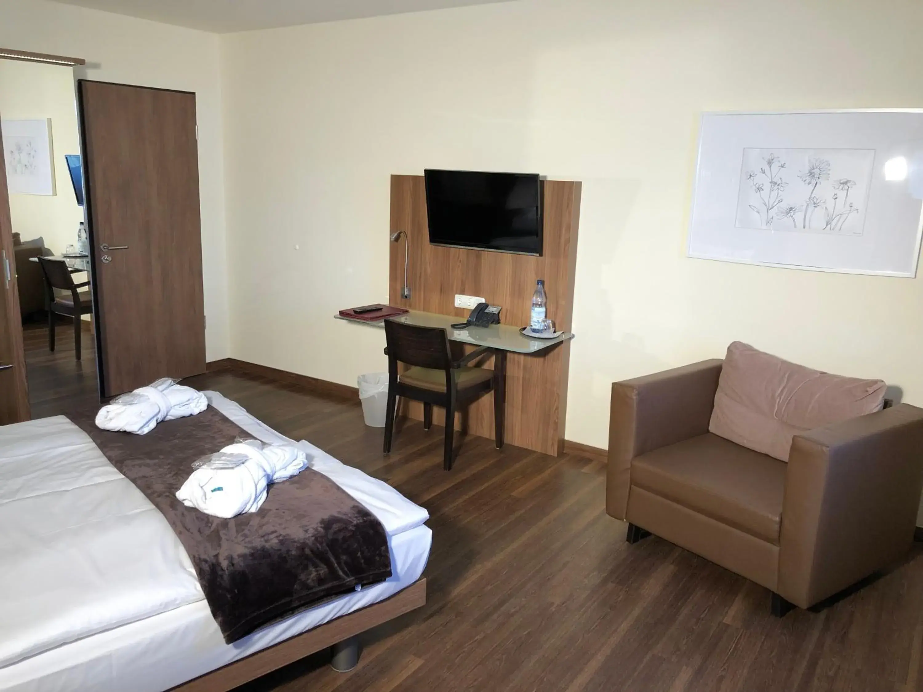 Standard Triple Room in Hotel Isenbütteler Hof Standard Triple Room in Hotel Isenbütteler Hof