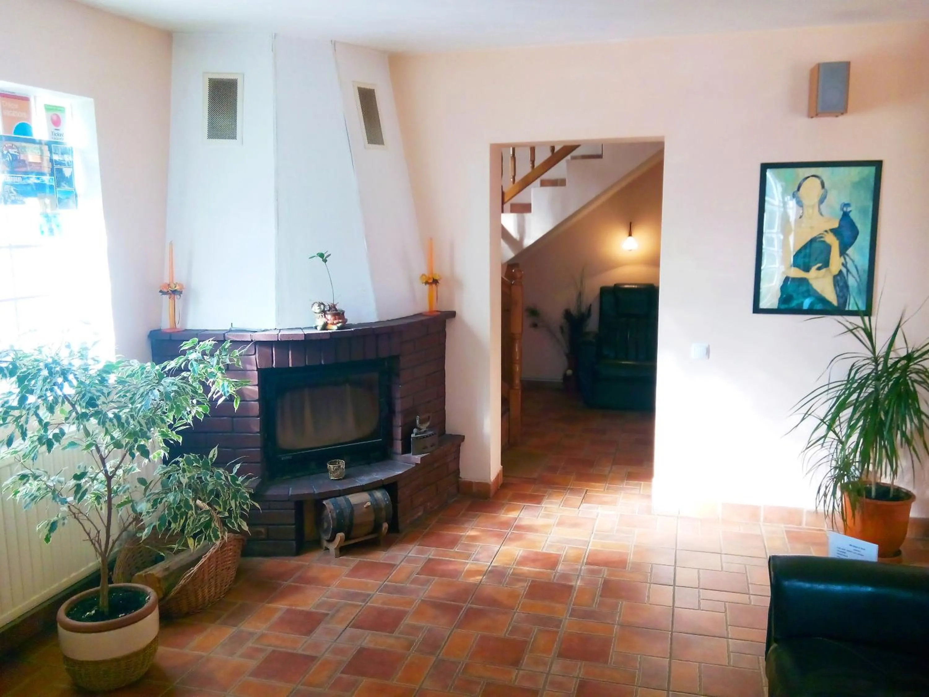 Communal lounge/ TV room in Pension Paunasul
