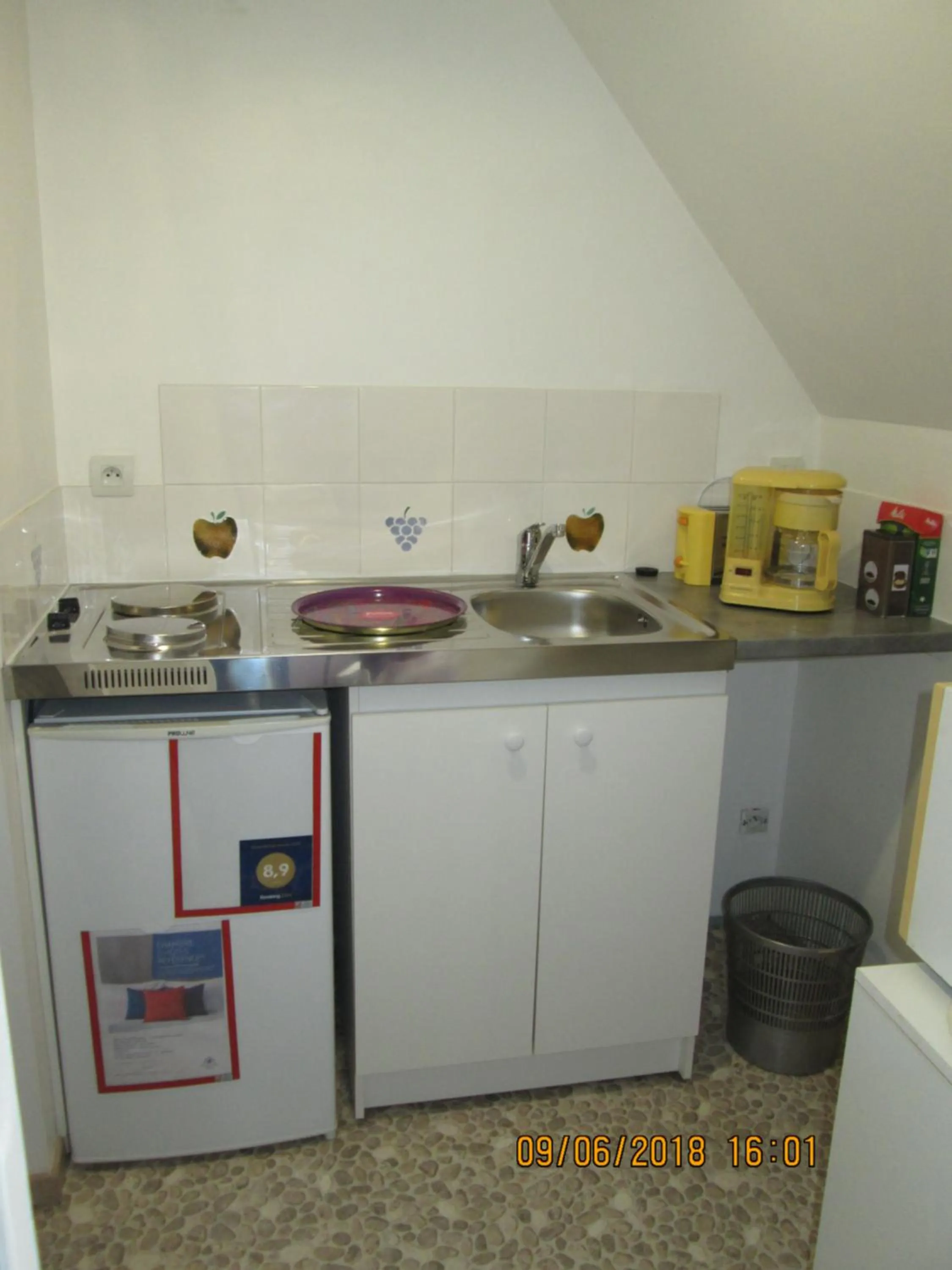 Kitchen or kitchenette in studios les Hortensias