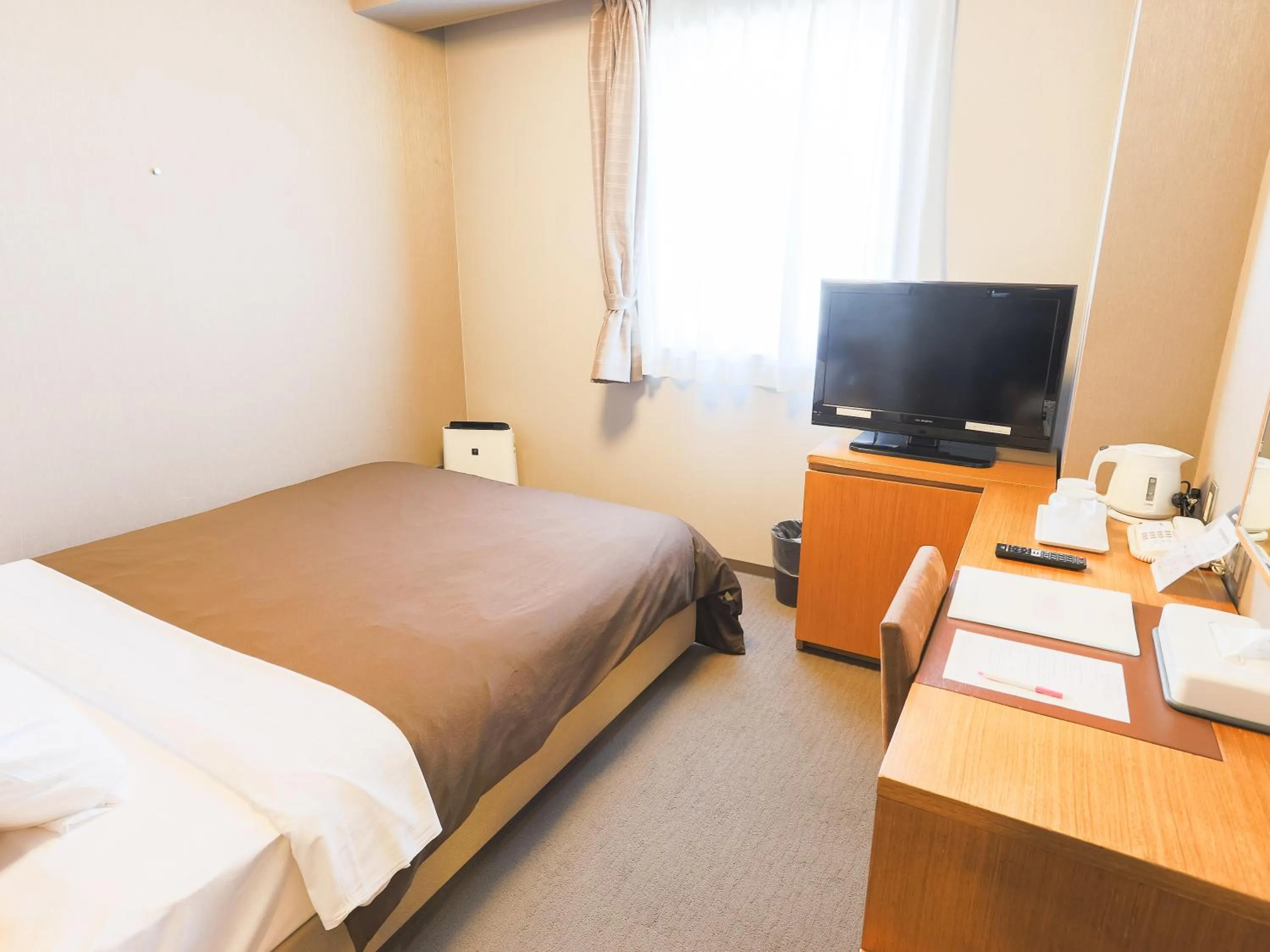 Bed in Castle Inn Sendai