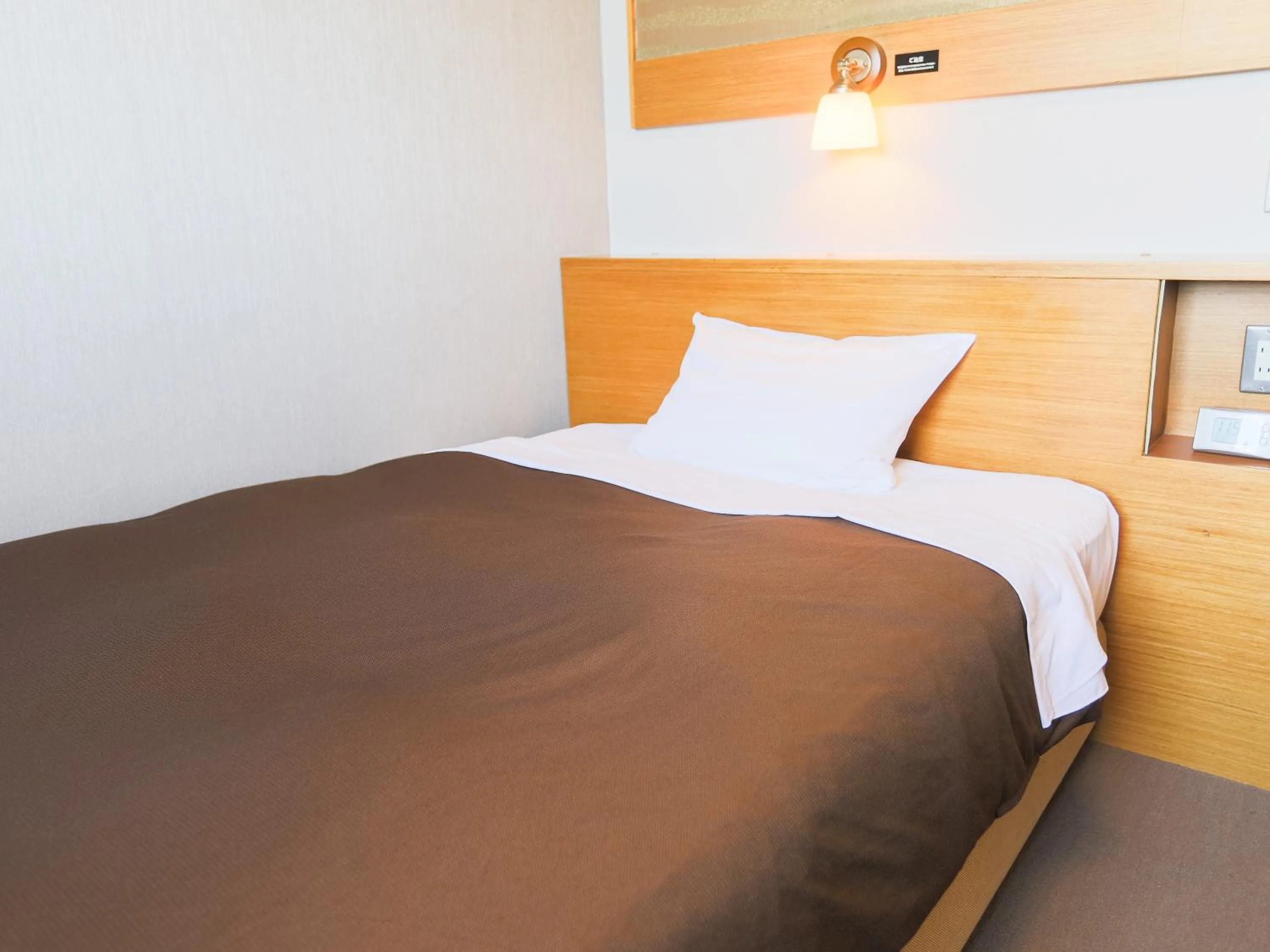 Bed in Castle Inn Sendai