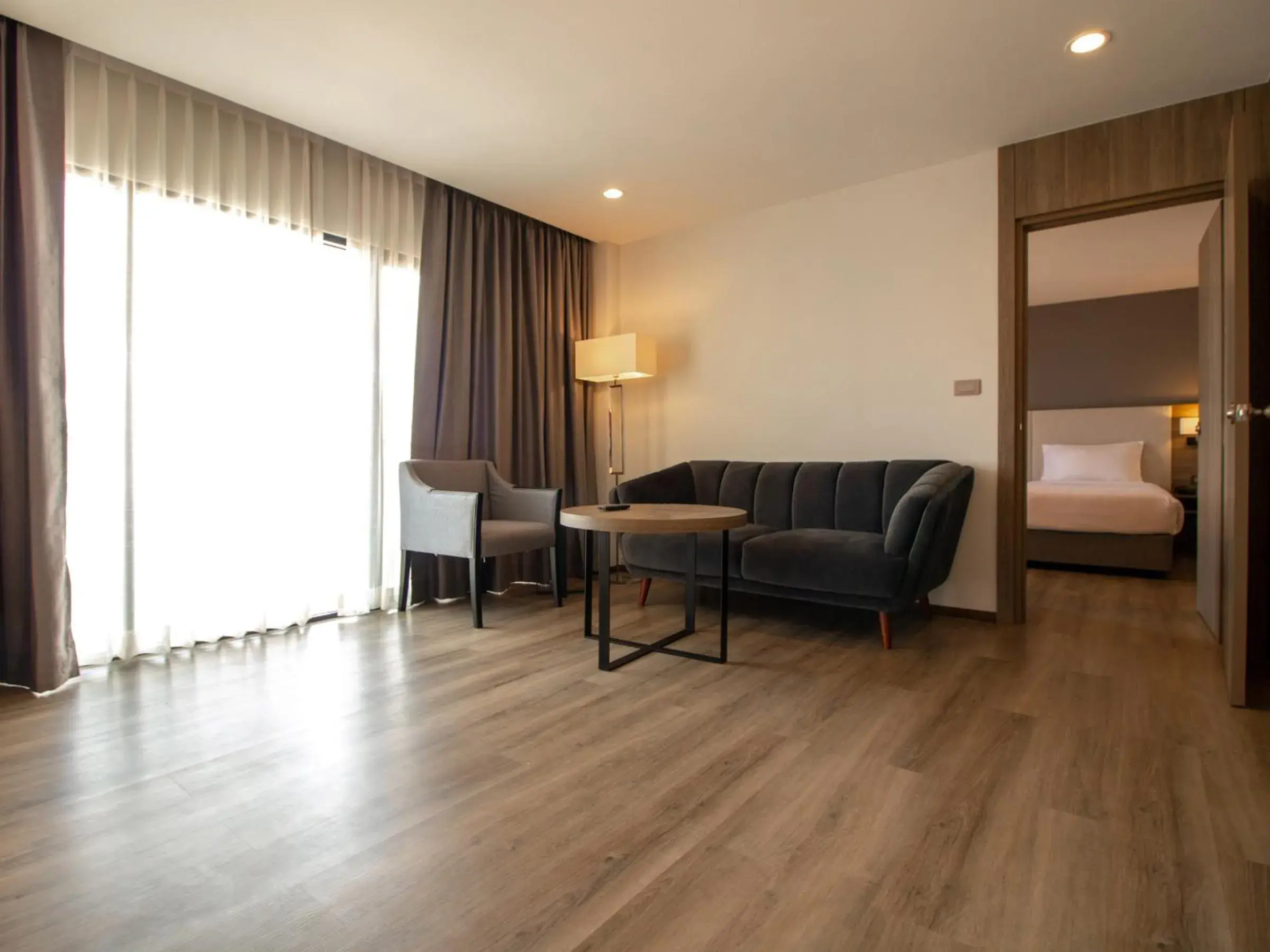 Living room, Bed in Fortune View Khong Hotel Nakhon Phanom Living room, Bed in Fortune View Khong Hotel Nakhon Phanom