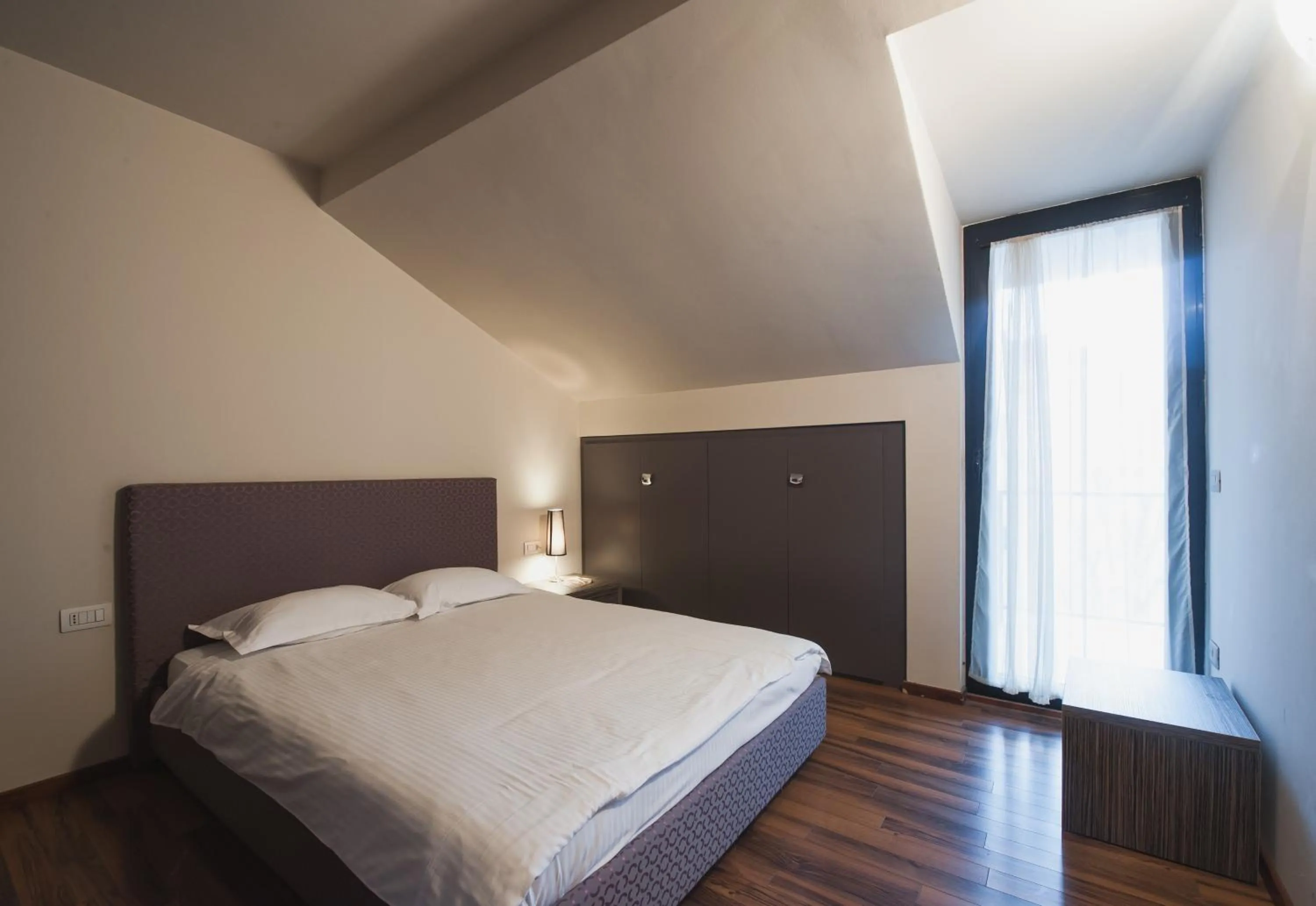 Bed in Hotel Hemingway Residence