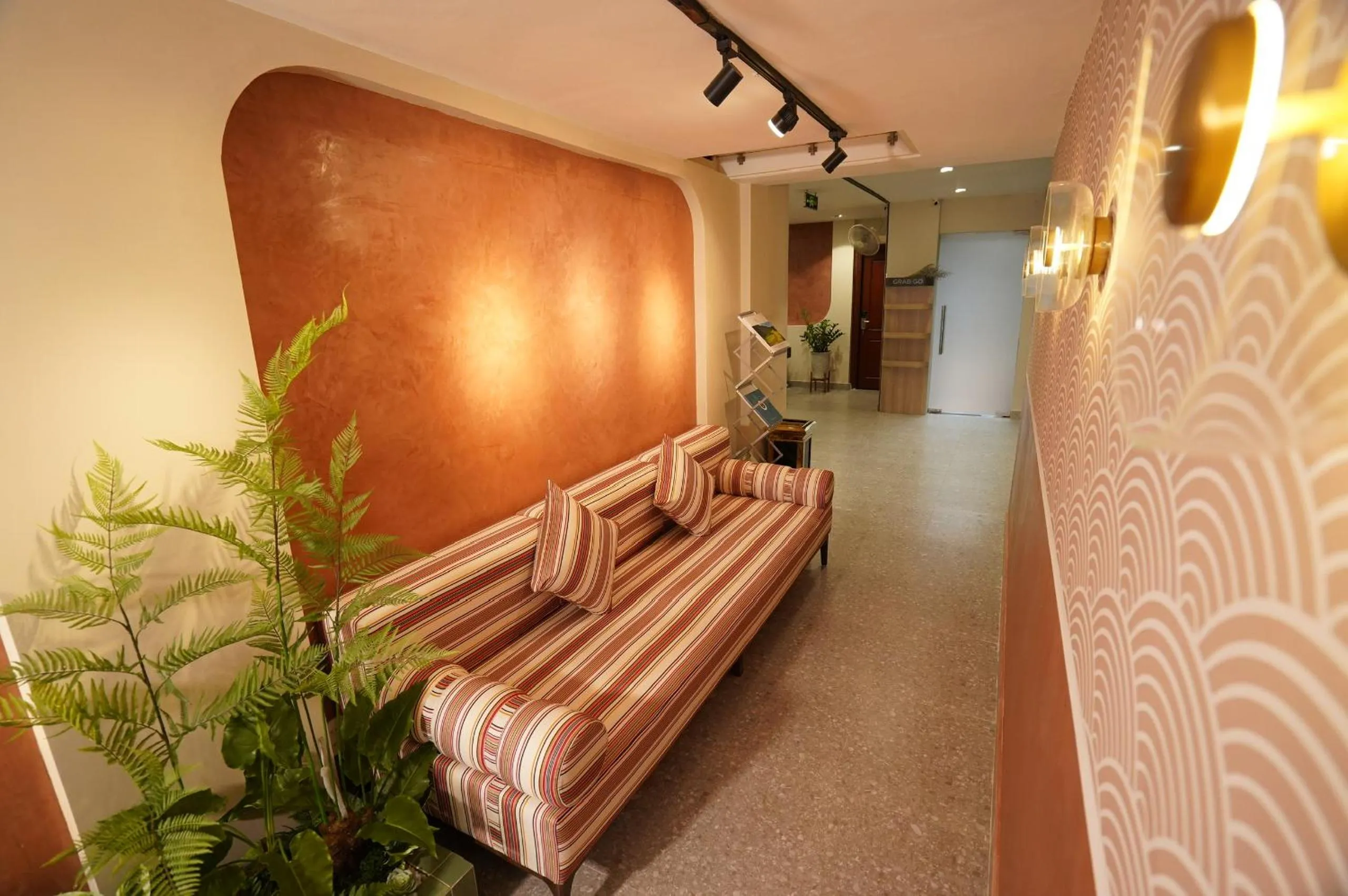 Seating area, Bed in An Nguyen Boutique Hotel