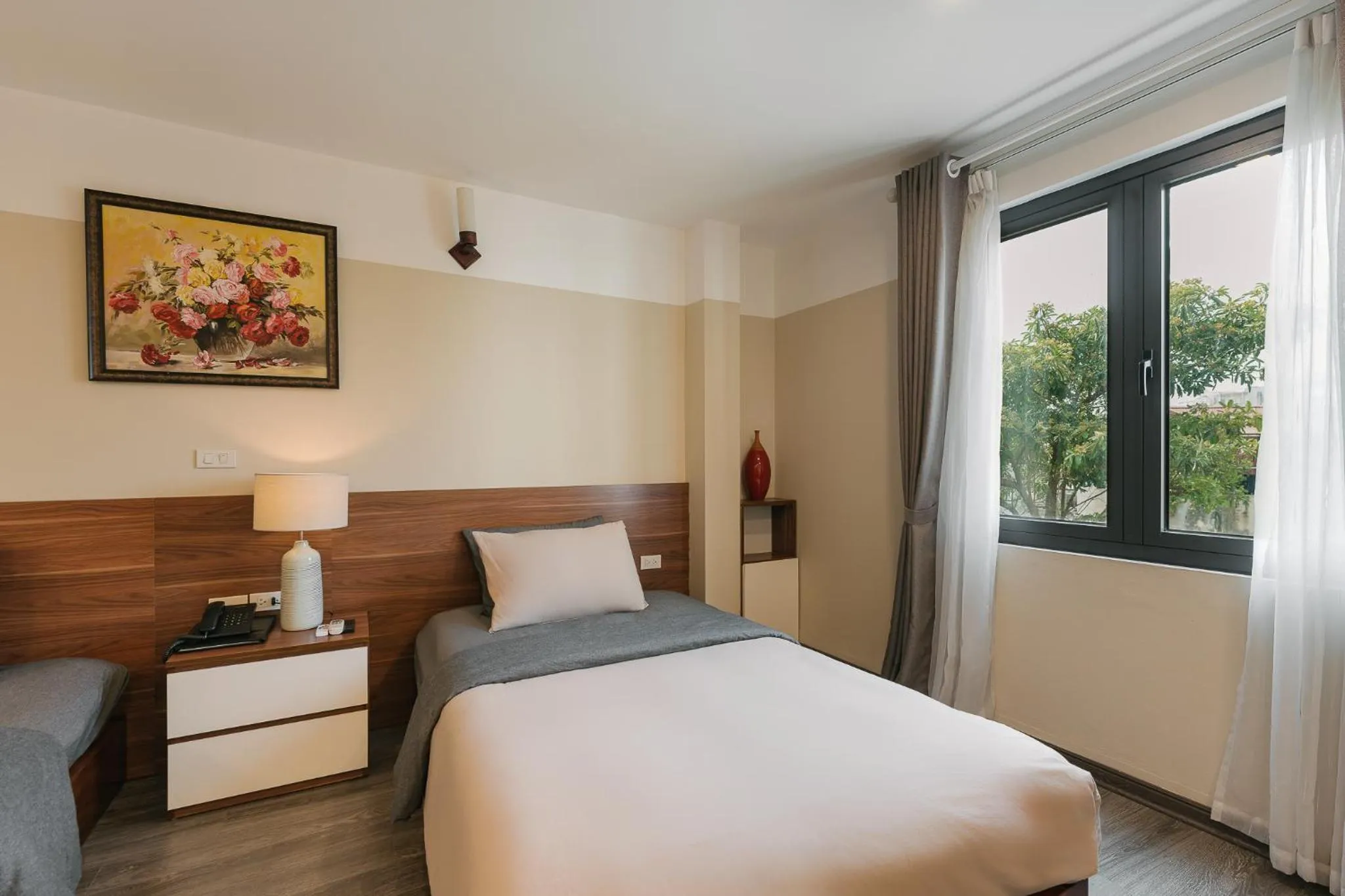 Bed in An Nguyen Boutique Hotel