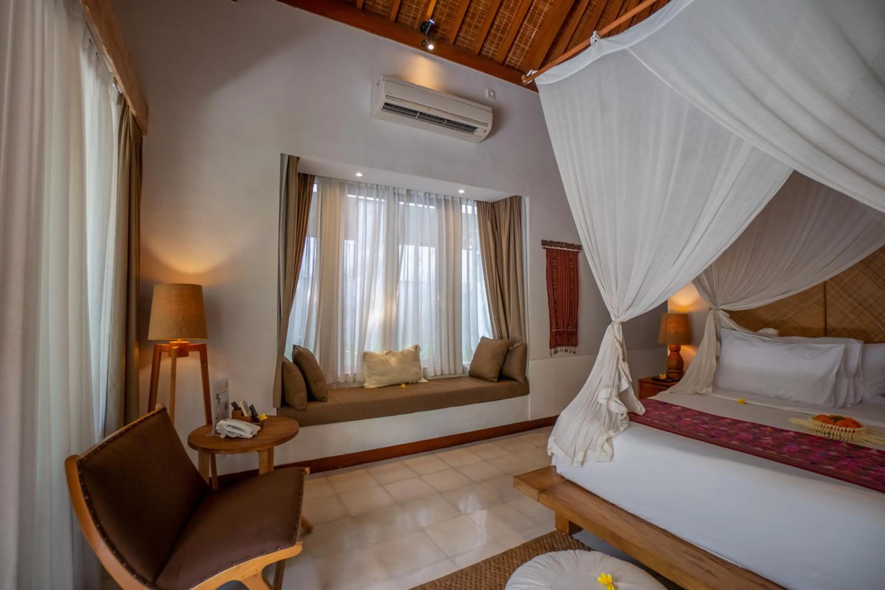 Bed in Purana Boutique Resort
