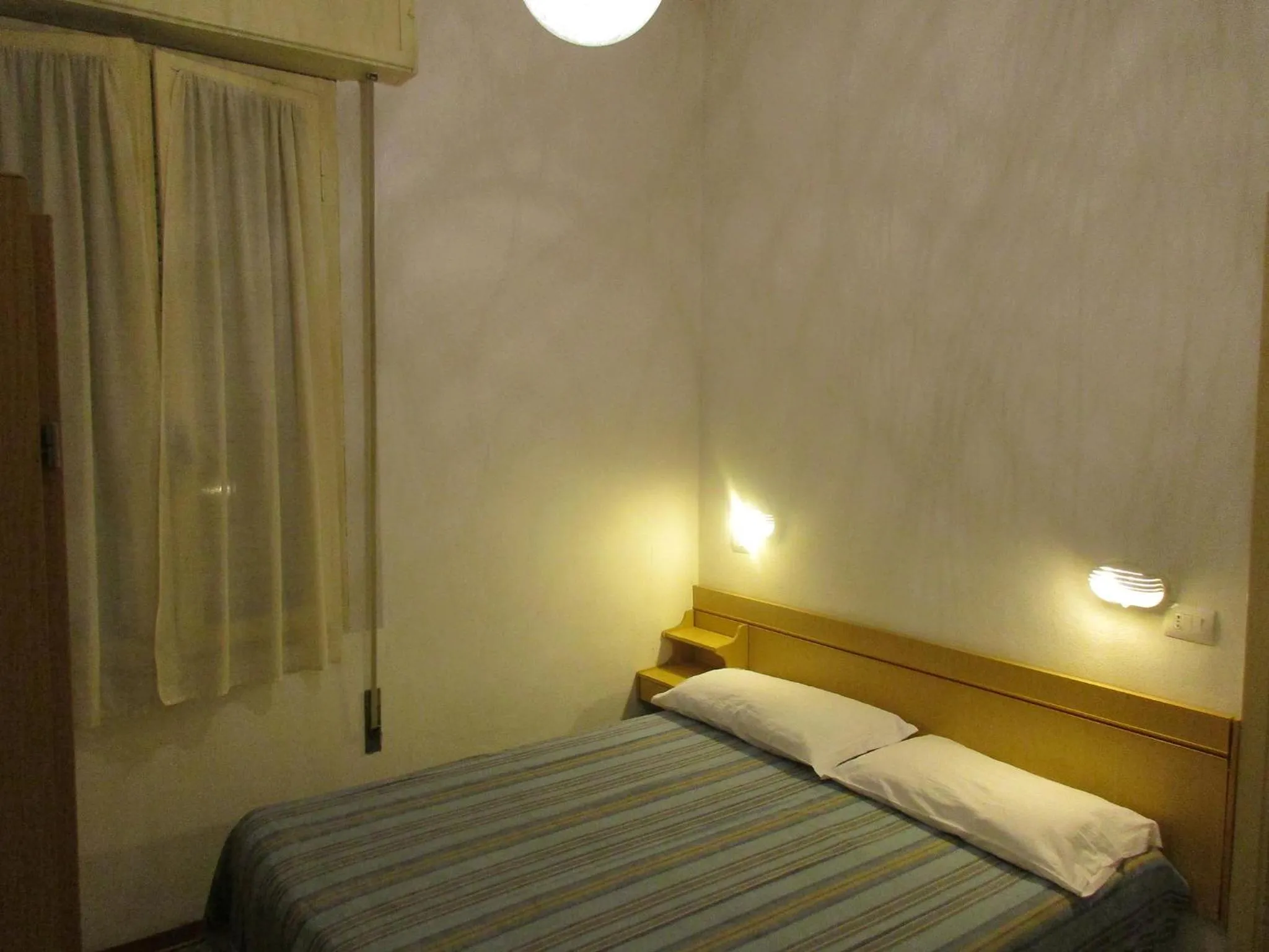 Bed in Hotel Pensione Ornella
