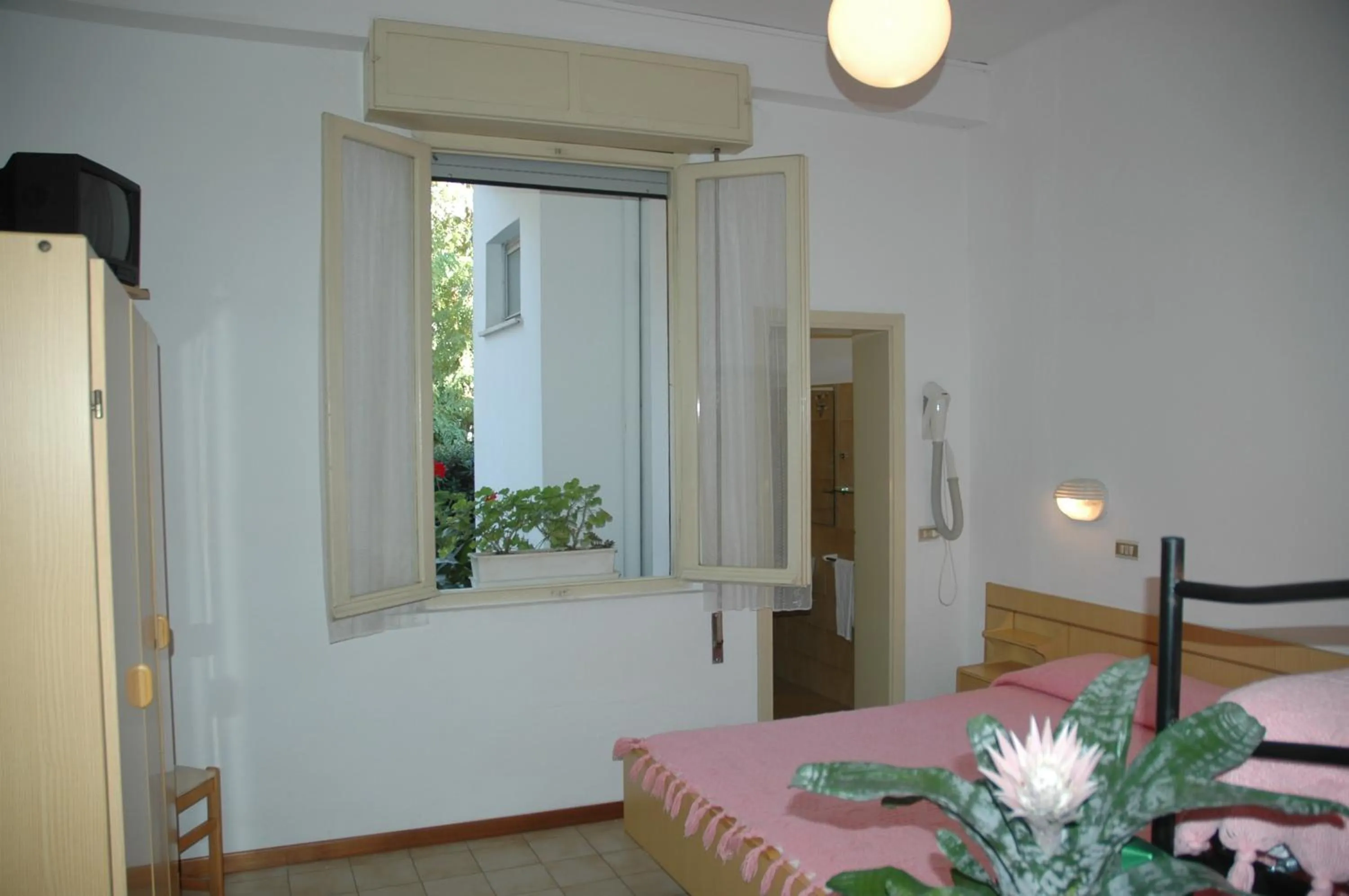 Bed in Hotel Pensione Ornella