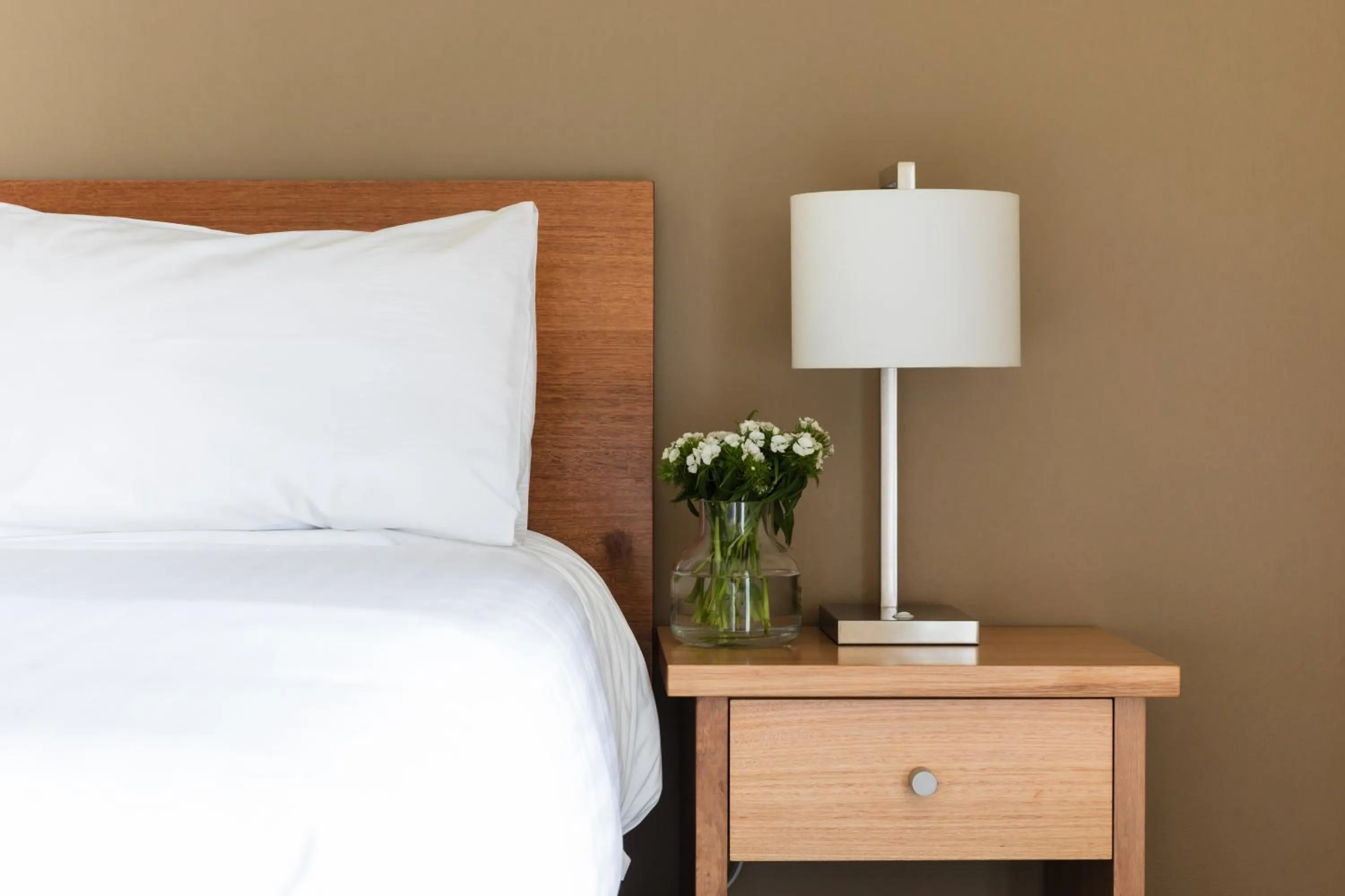 Bed in The Old Woolstore Apartment Hotel