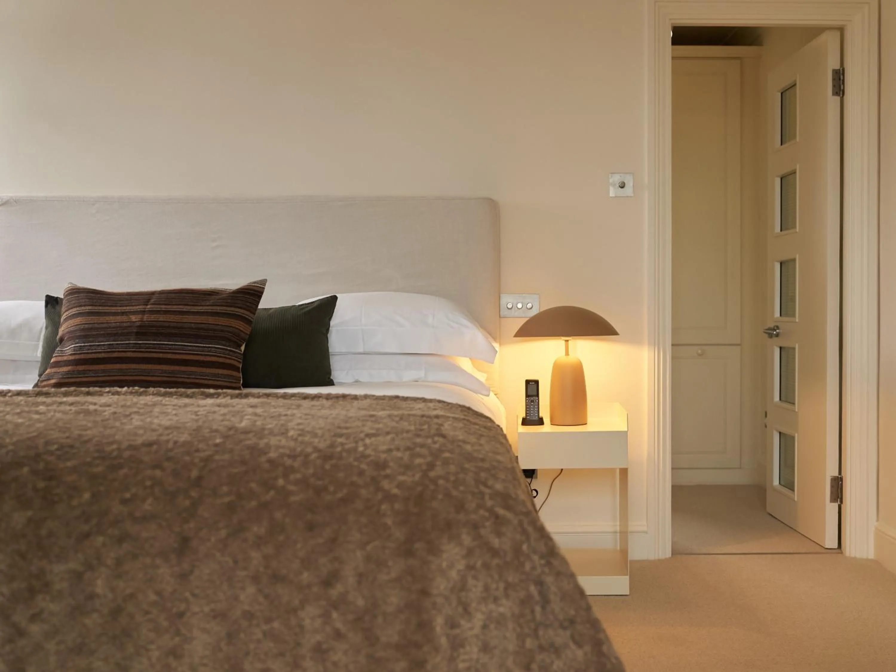 Bed in Europa House Apartments