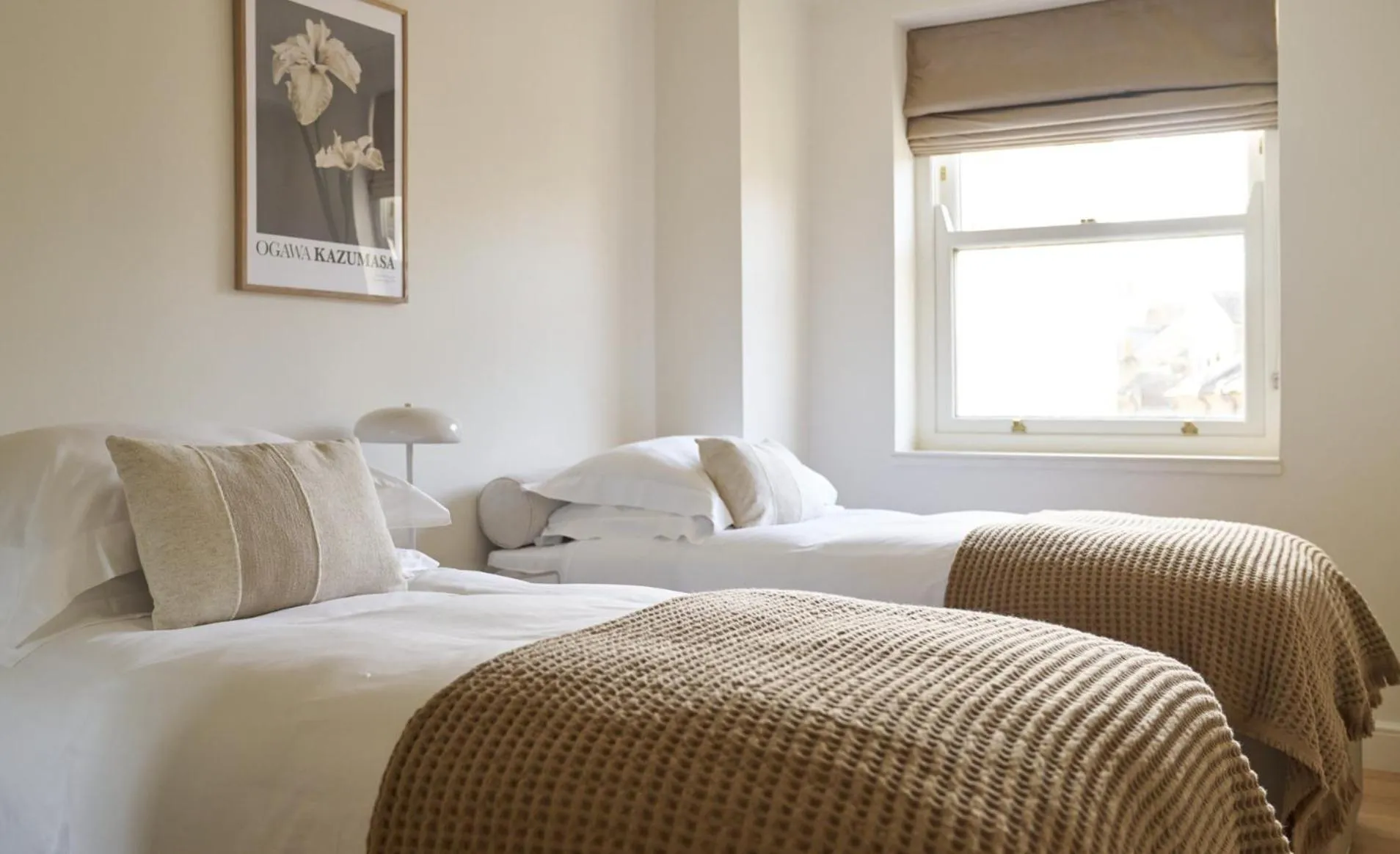 Bed in Europa House Apartments