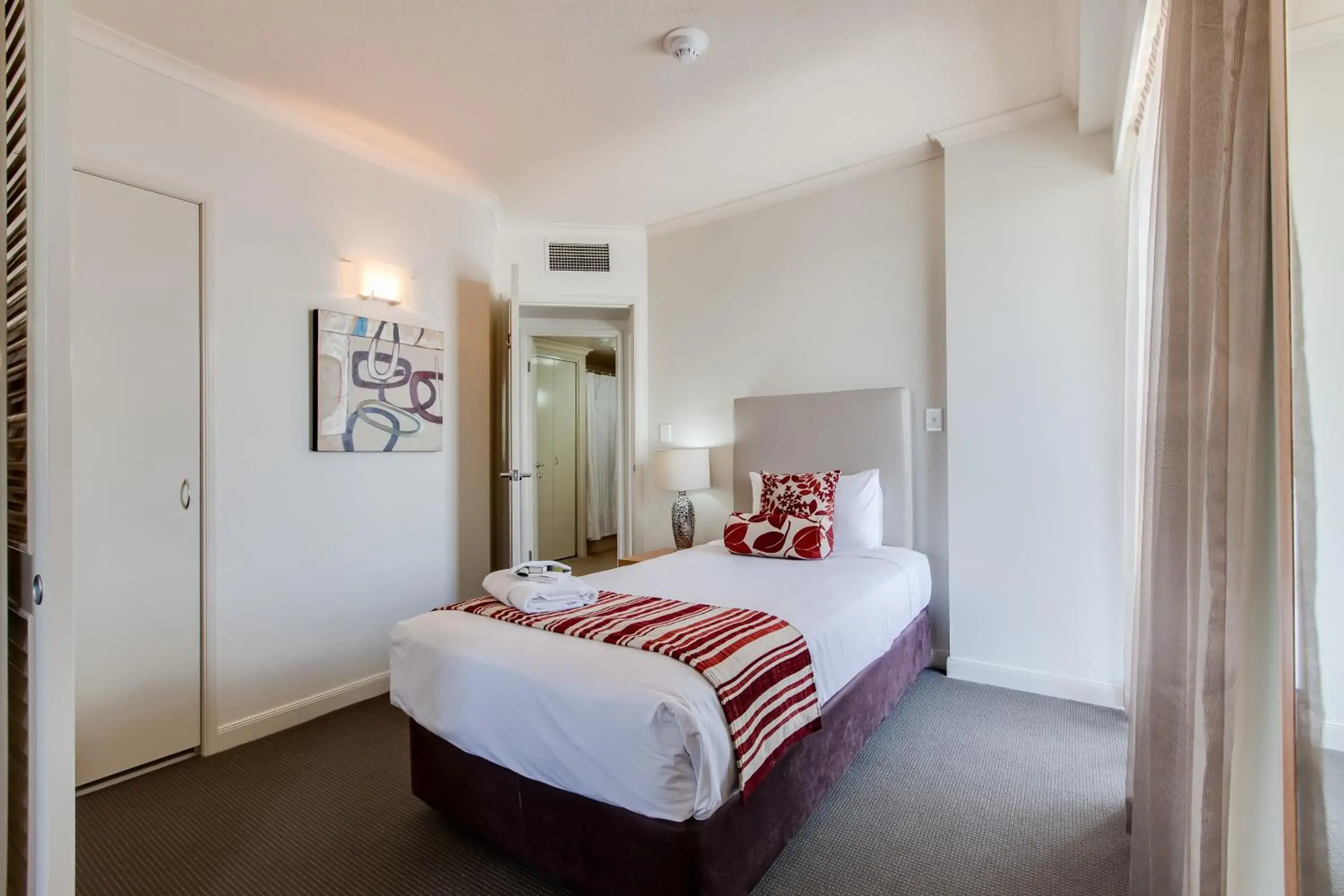 Bed in Cosmo Apartment Hotel Bed in Cosmo Apartment Hotel