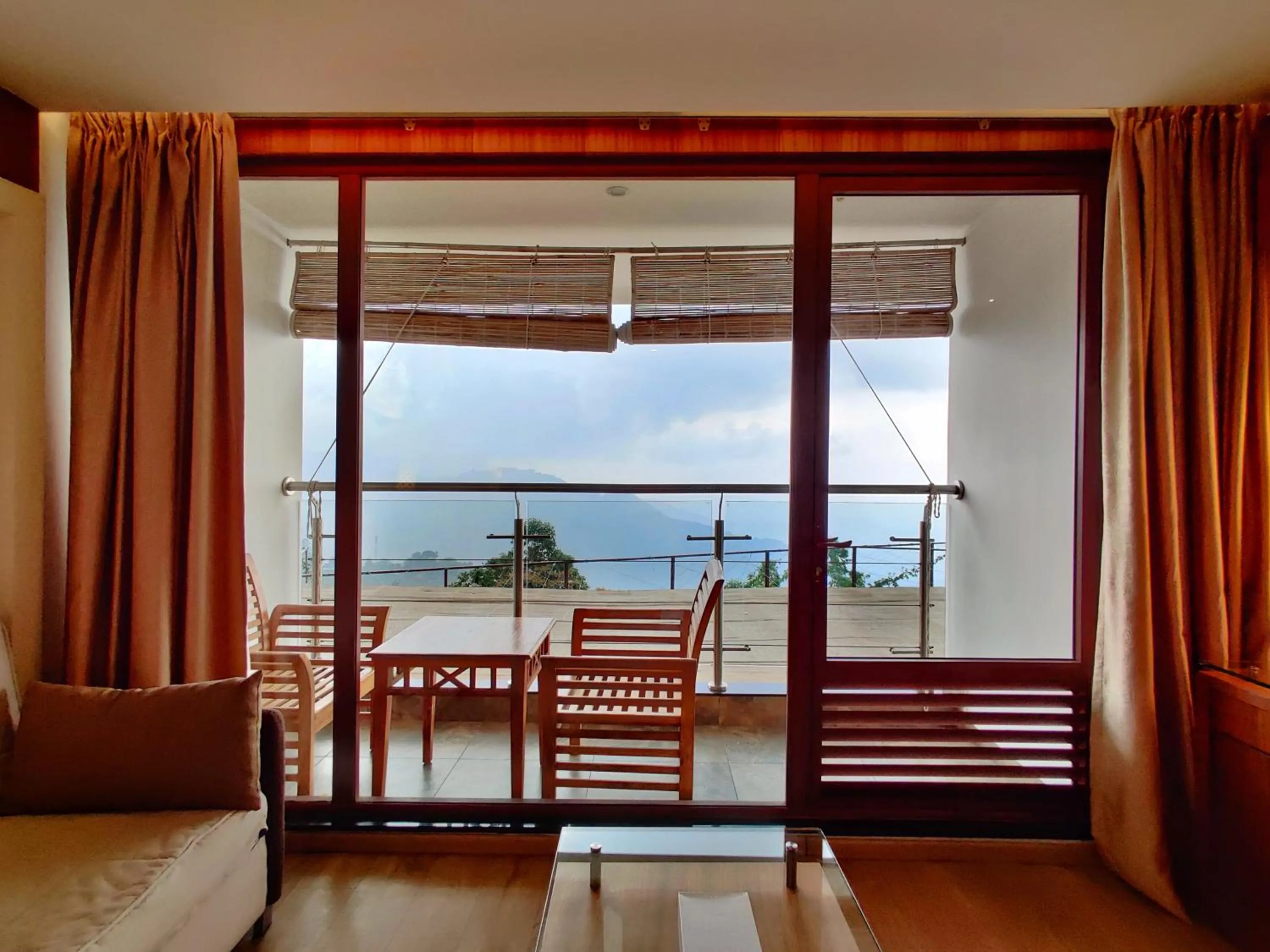 Living room in Amber Dale Luxury Hotel & Spa, Munnar