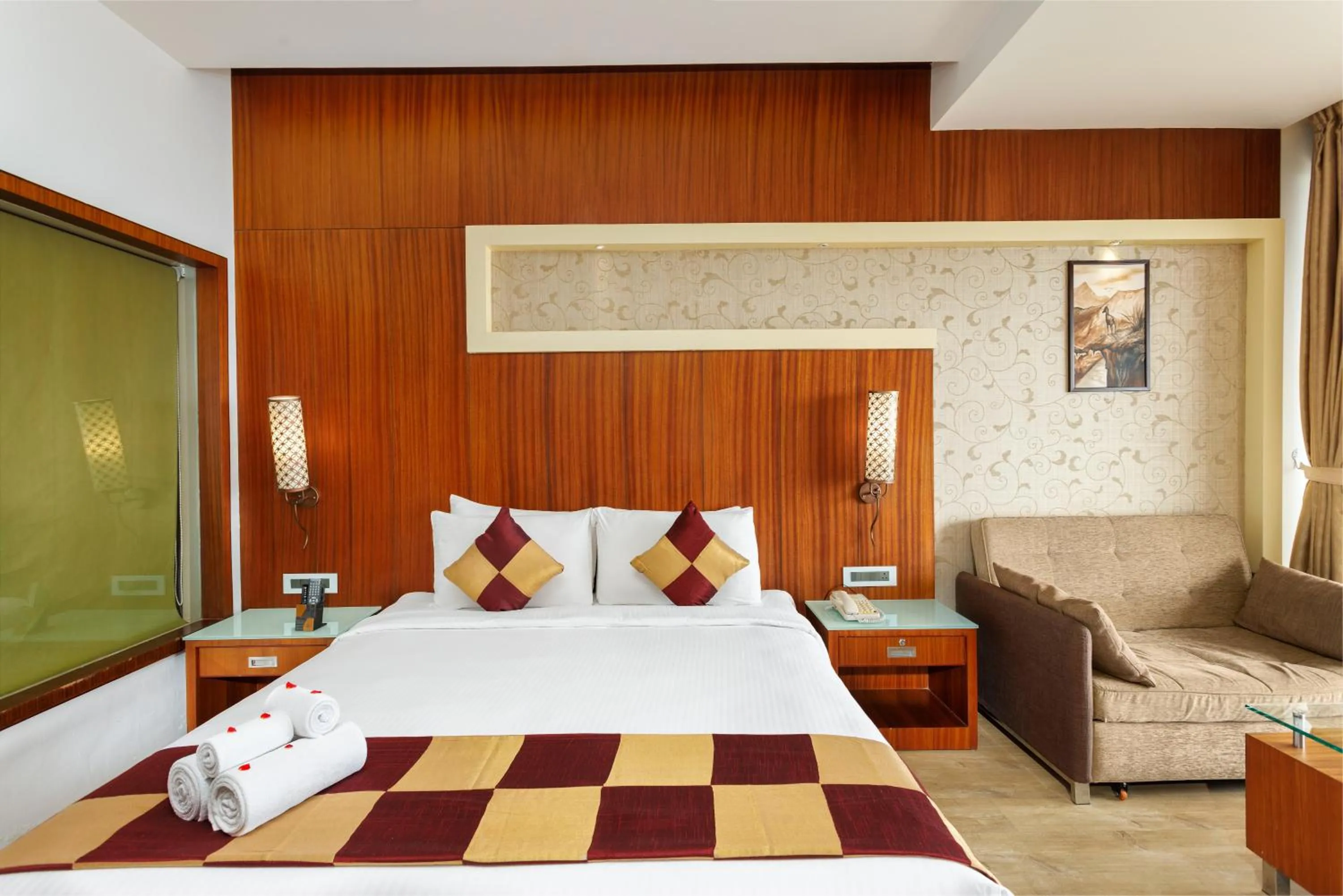 Bed in Amber Dale Luxury Hotel & Spa, Munnar