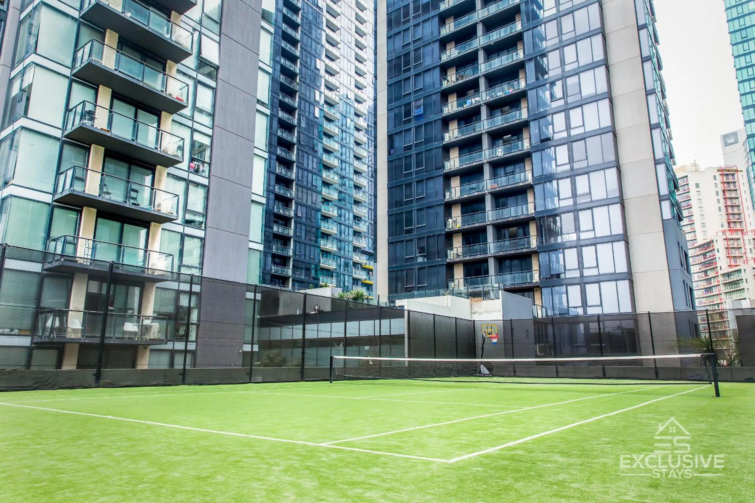 Tennis court in Exclusive Stays - Sentinel