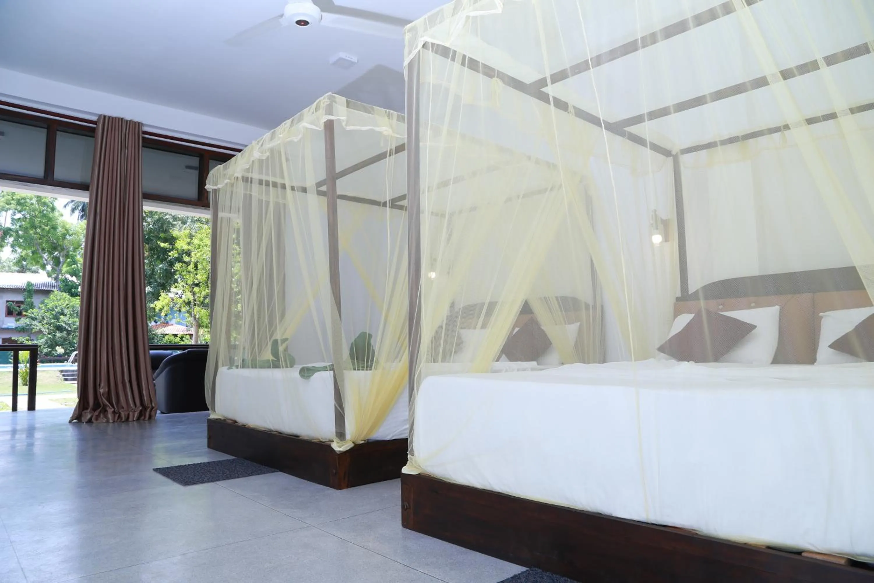 Bed in The Grand Yala Hotel