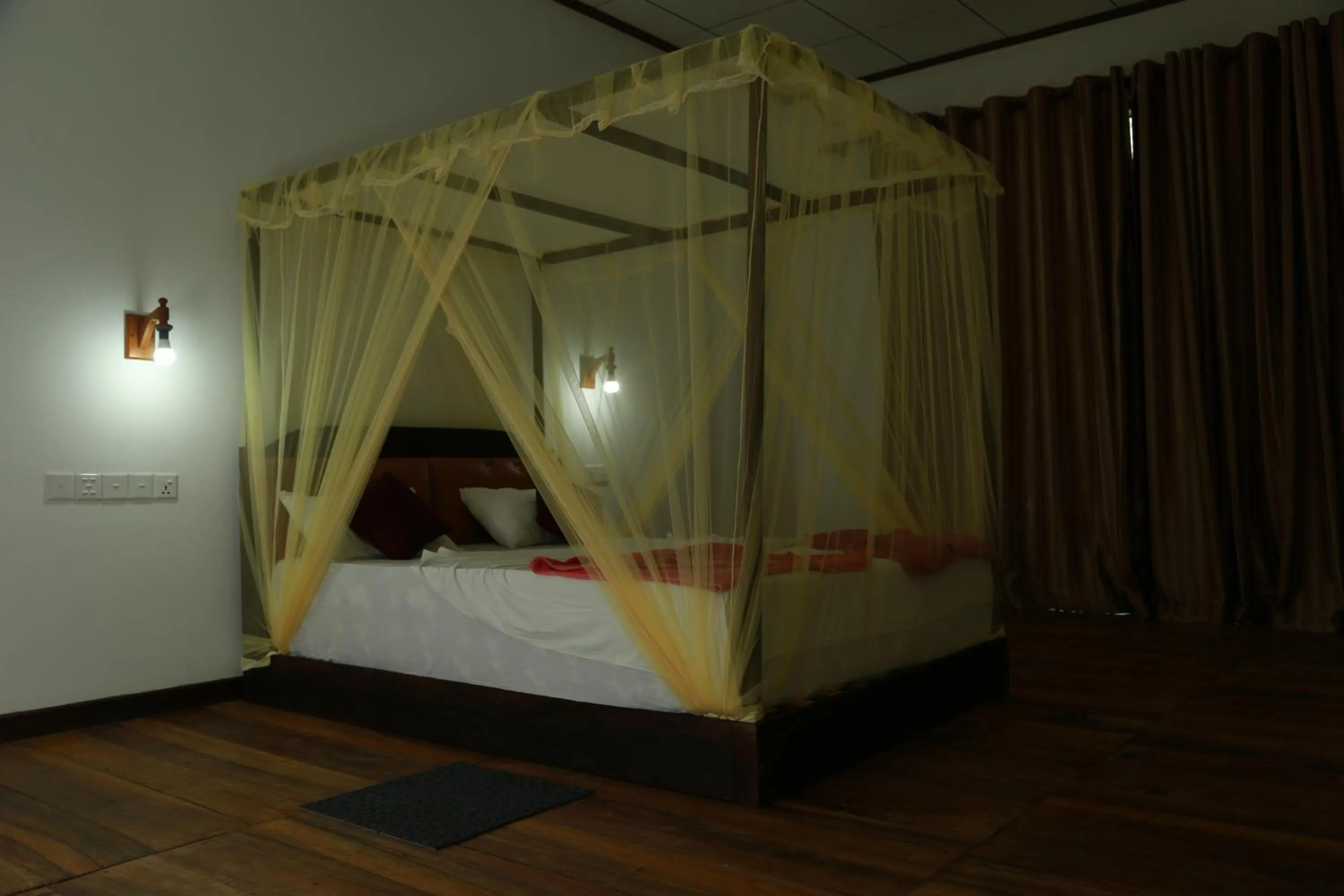 Bed in The Grand Yala Hotel
