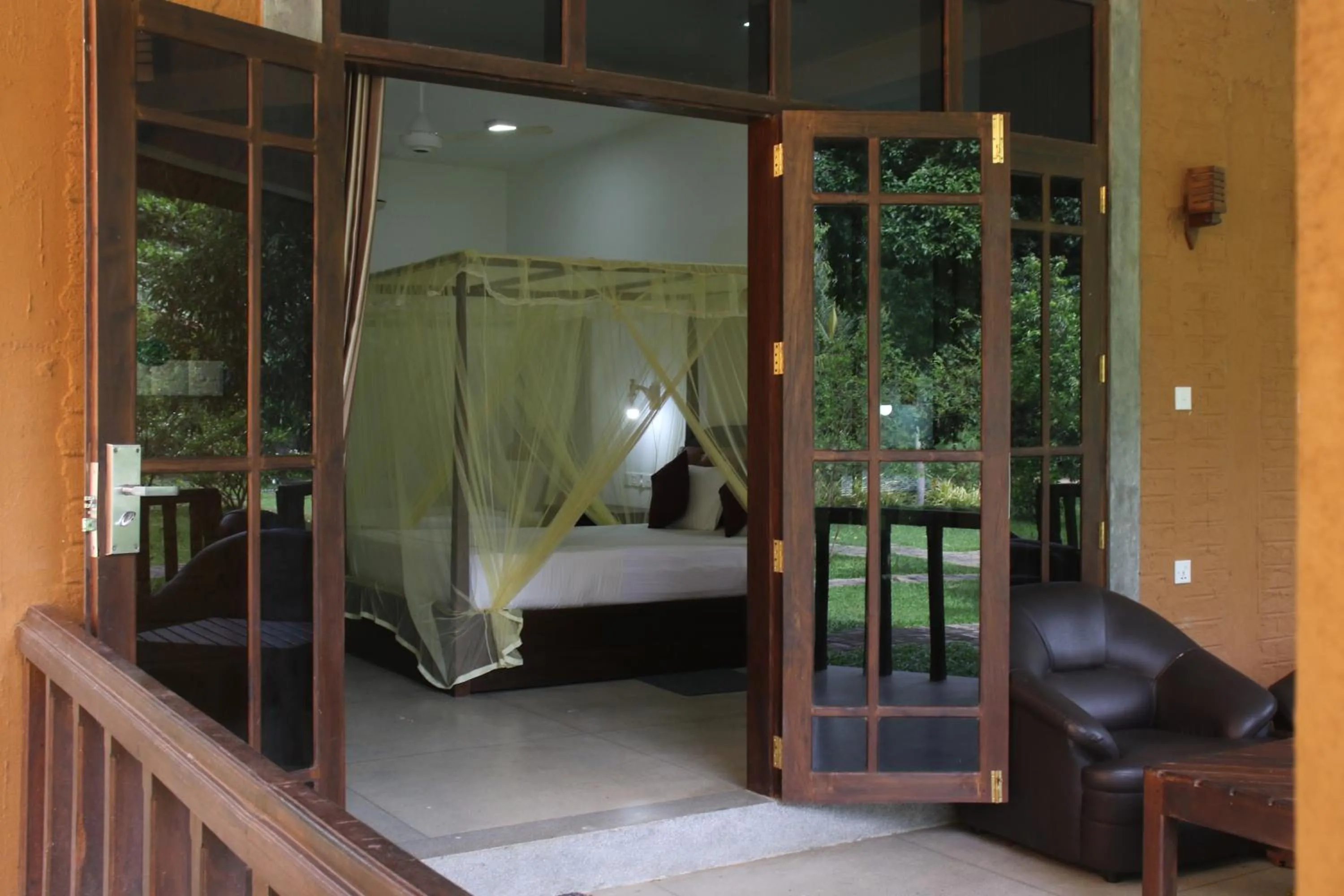 Bed in The Grand Yala Hotel
