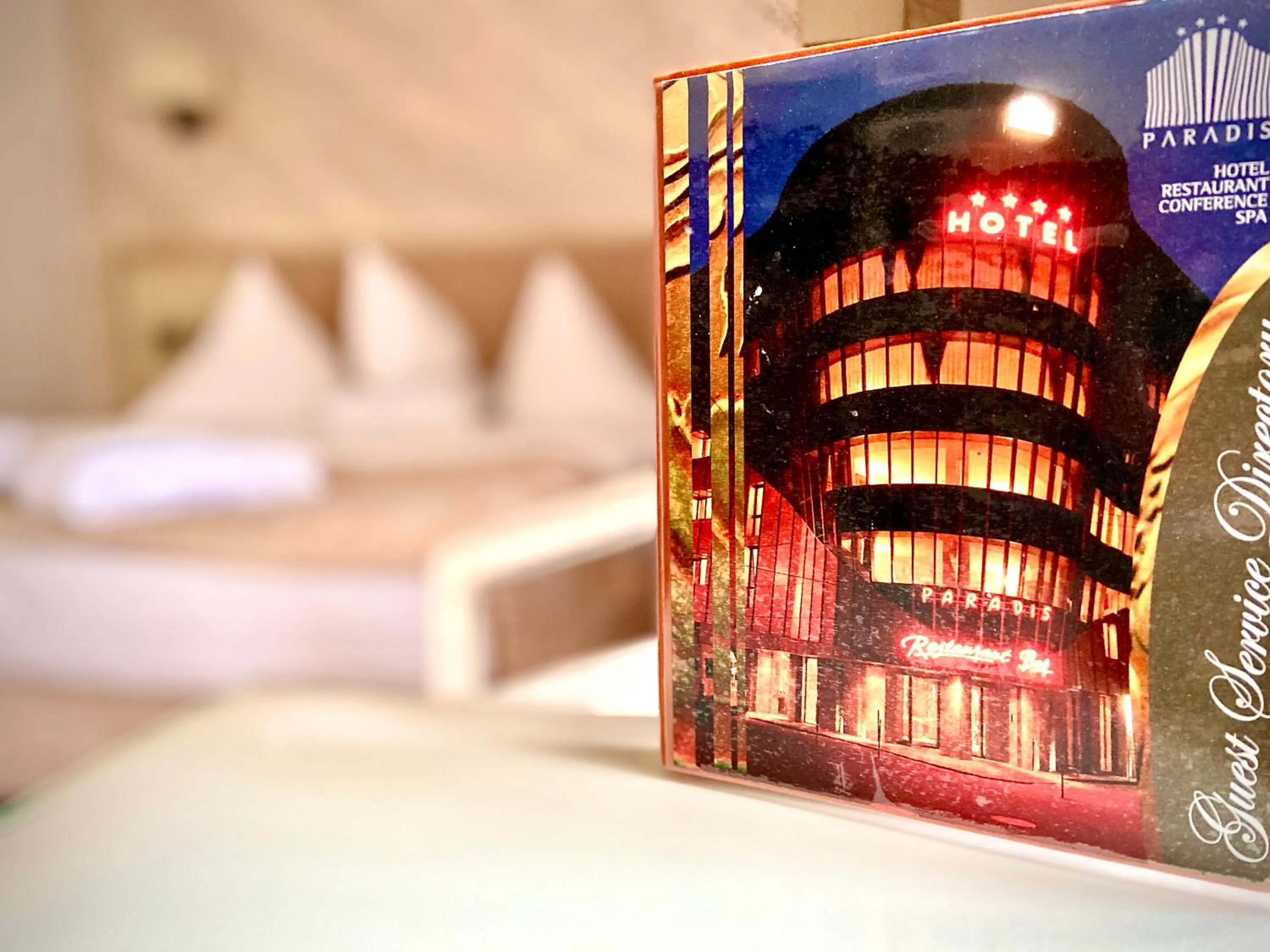 Bed in Hotel Paradis