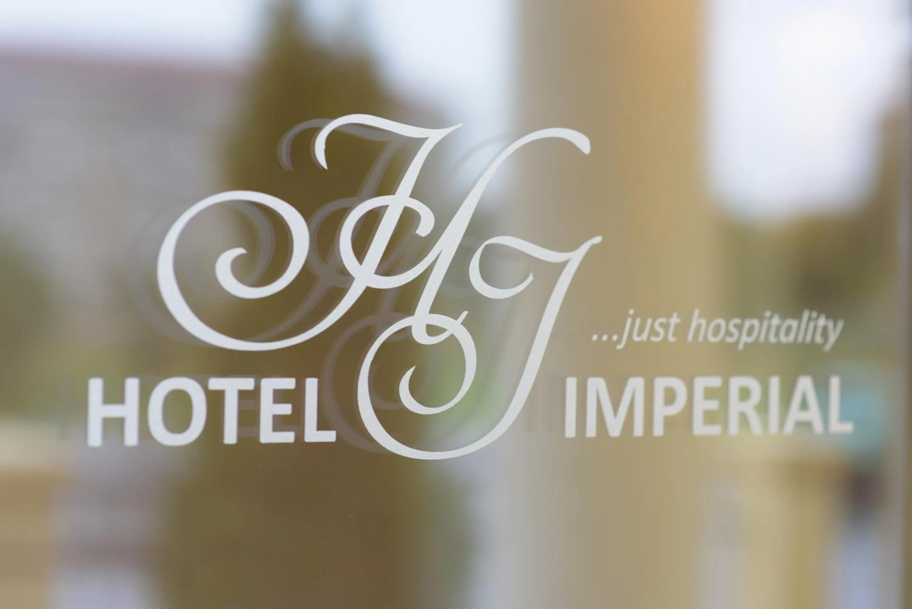 Property logo or sign in Hotel Imperial