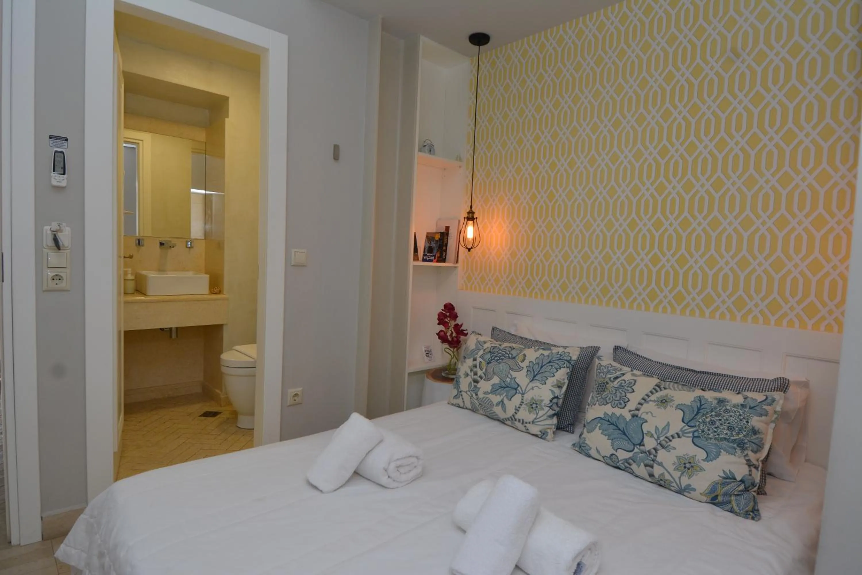 Bed in Candia Suites & Rooms