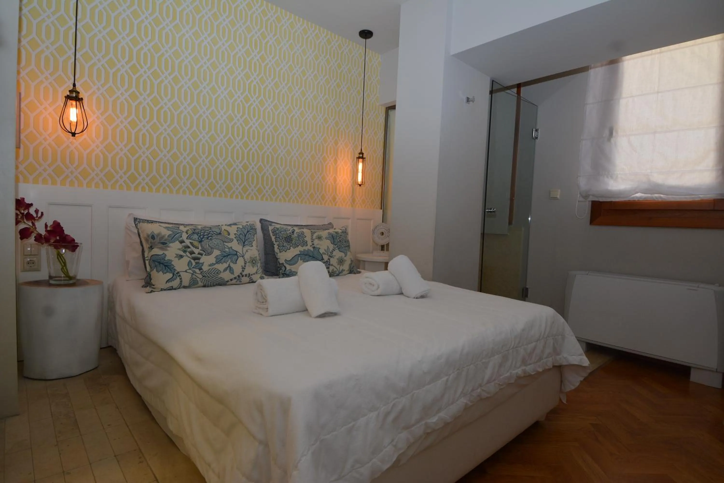 Bed in Candia Suites & Rooms