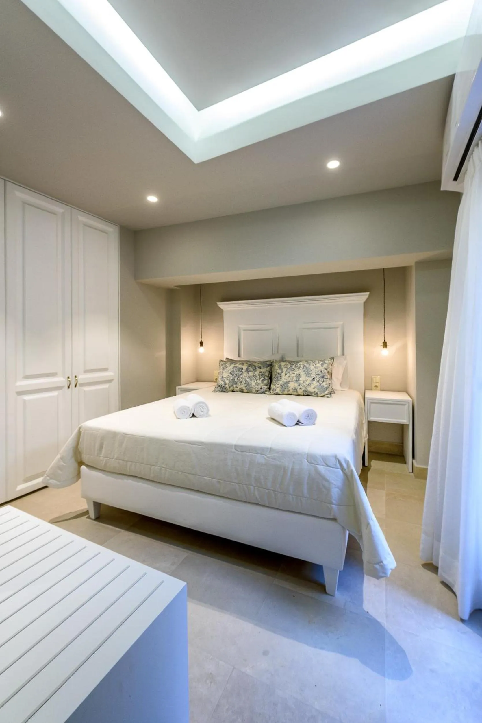 Bed in Candia Suites & Rooms
