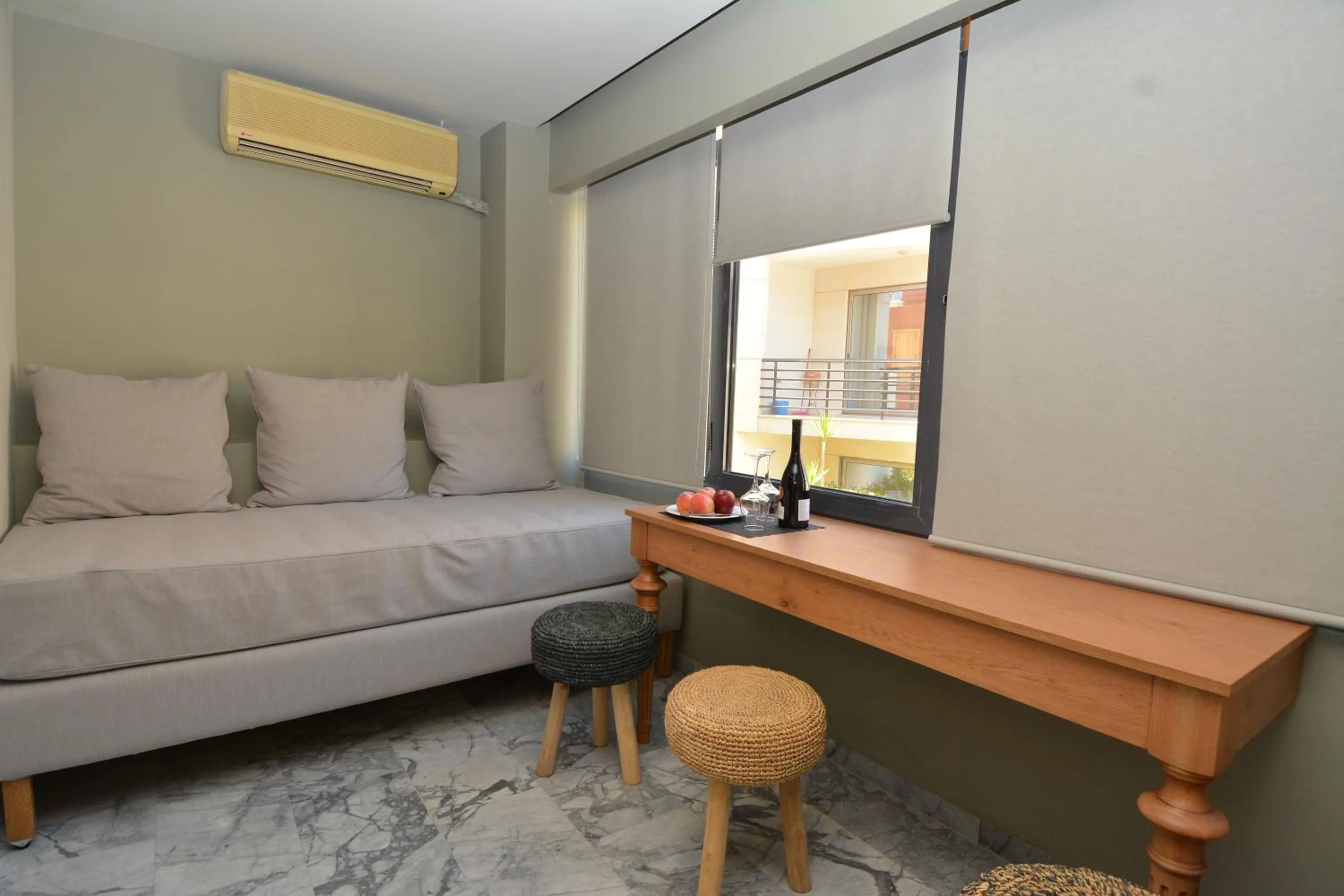 Bed in Candia Suites & Rooms