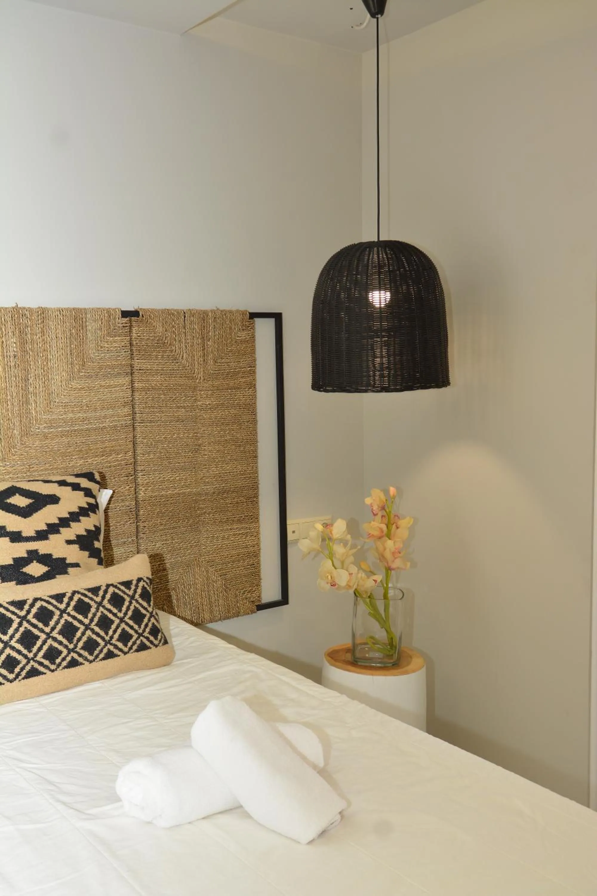 Bed in Candia Suites & Rooms