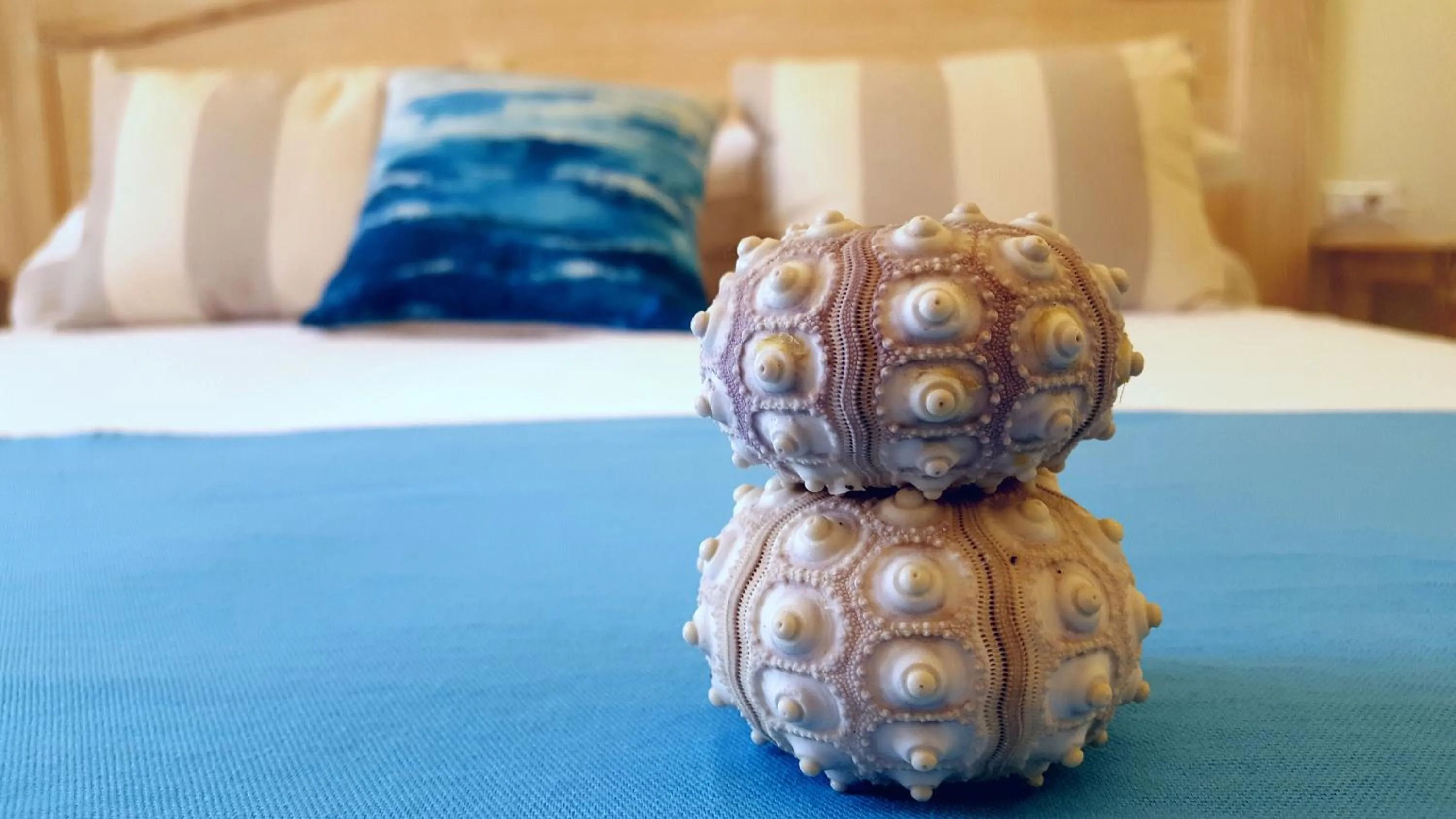 Bed in Brezza Marina Luxury Rooms