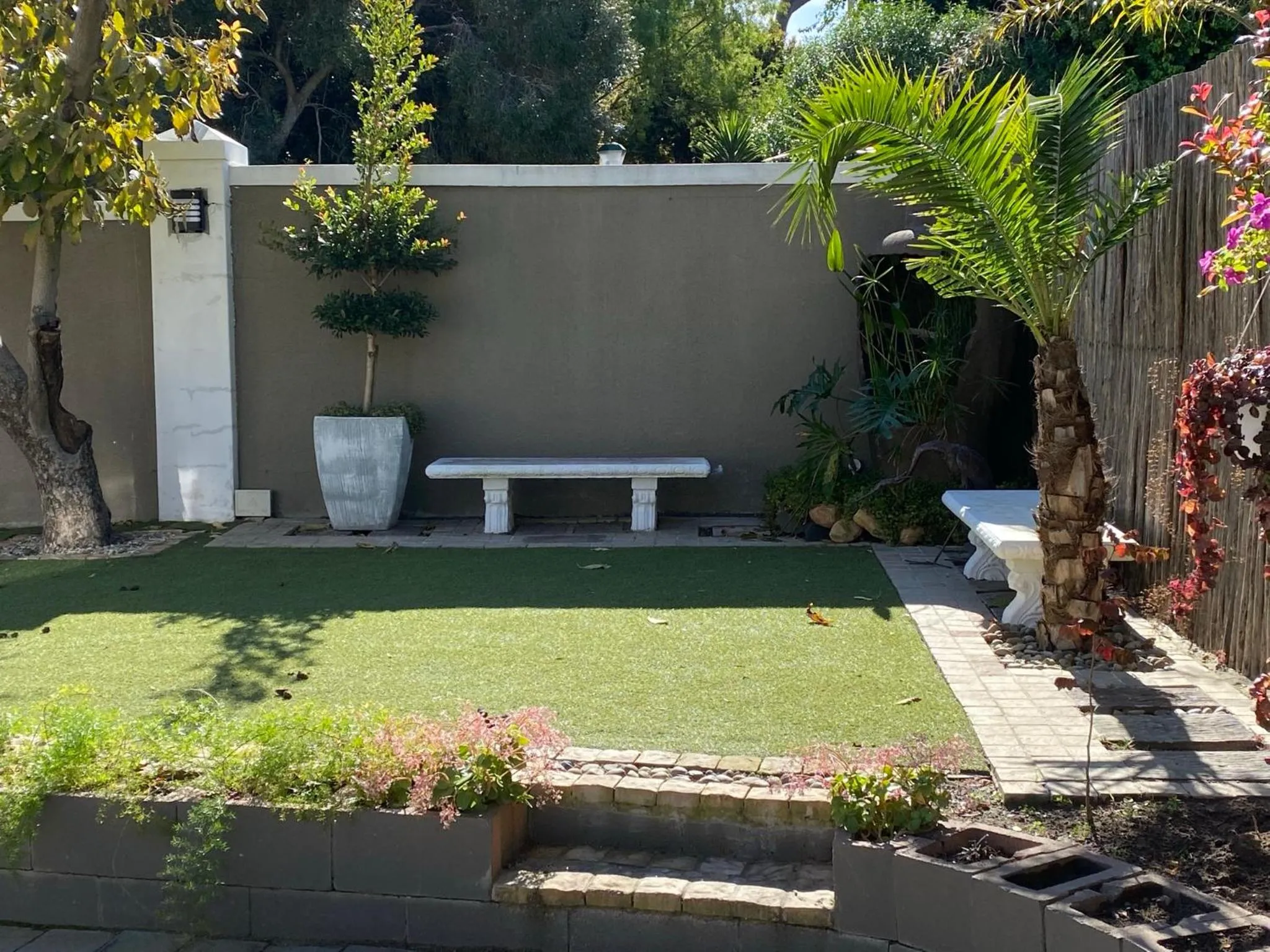 Garden view in Milas Place