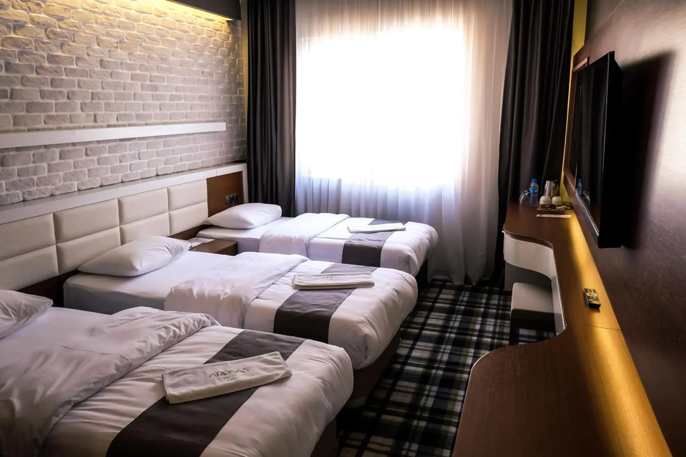 Bed in Aripsas Hotel Bed in Aripsas Hotel