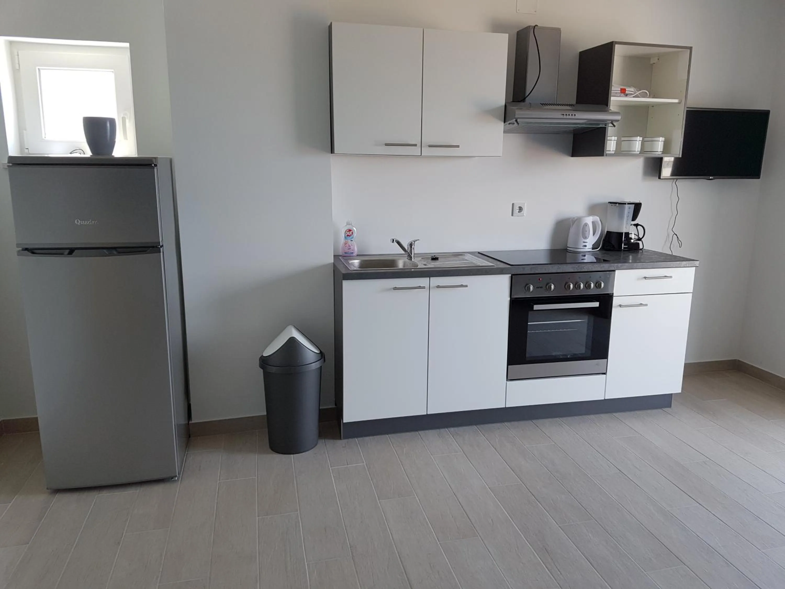 Kitchen or kitchenette in Apartments Tereza