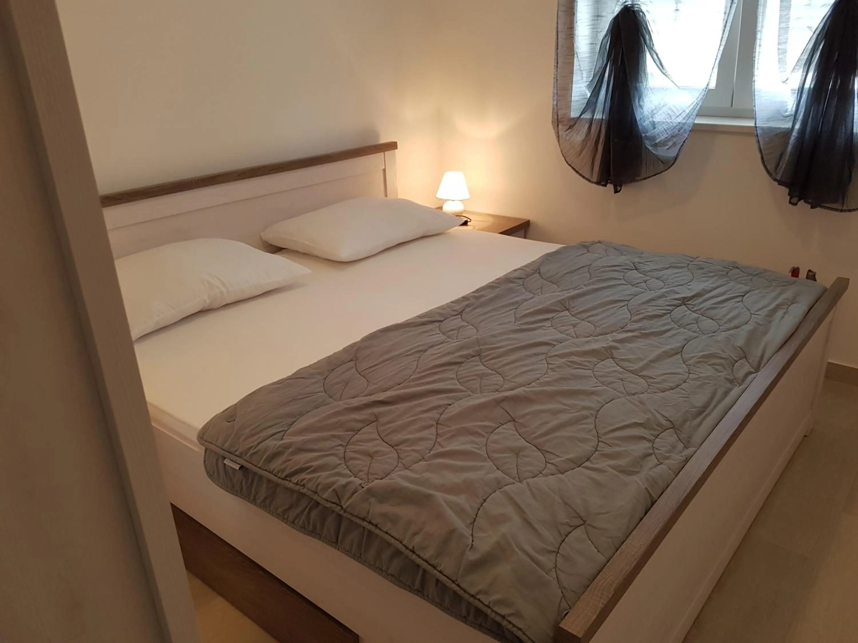 Bed in Apartments Tereza