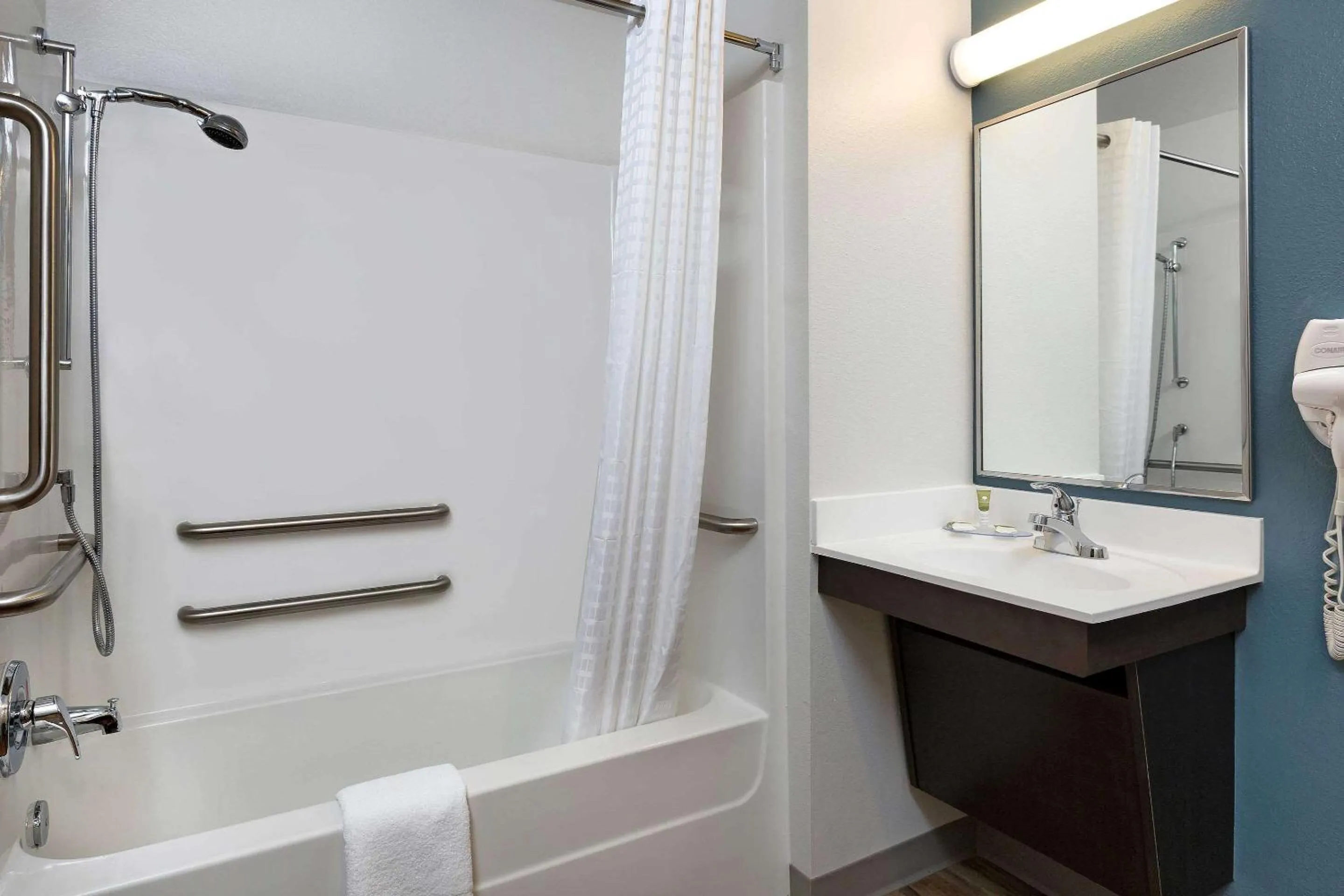 Bathroom in Woodspring Suites Houston IAH Airport