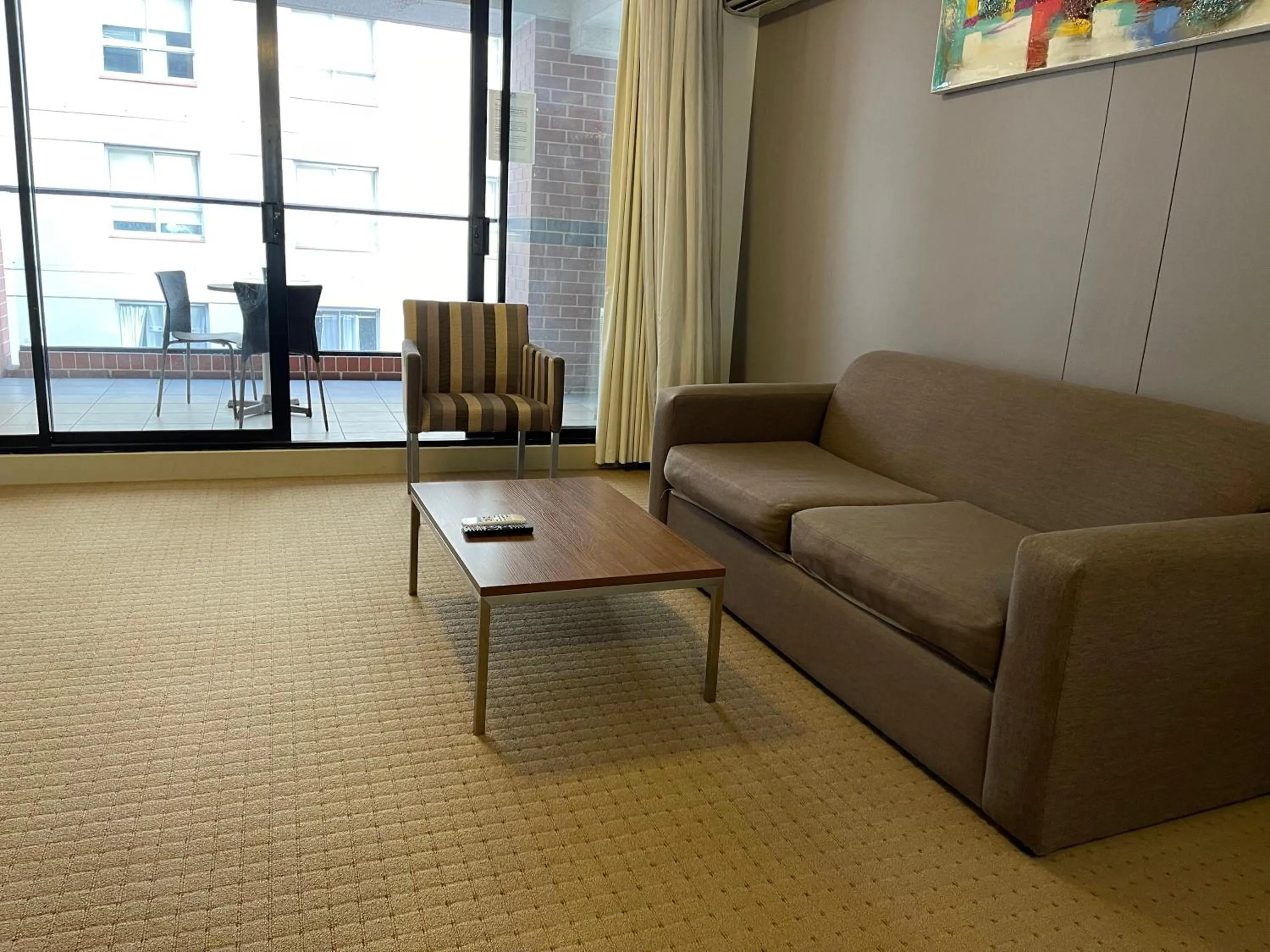 Living room in APX Darling Harbour