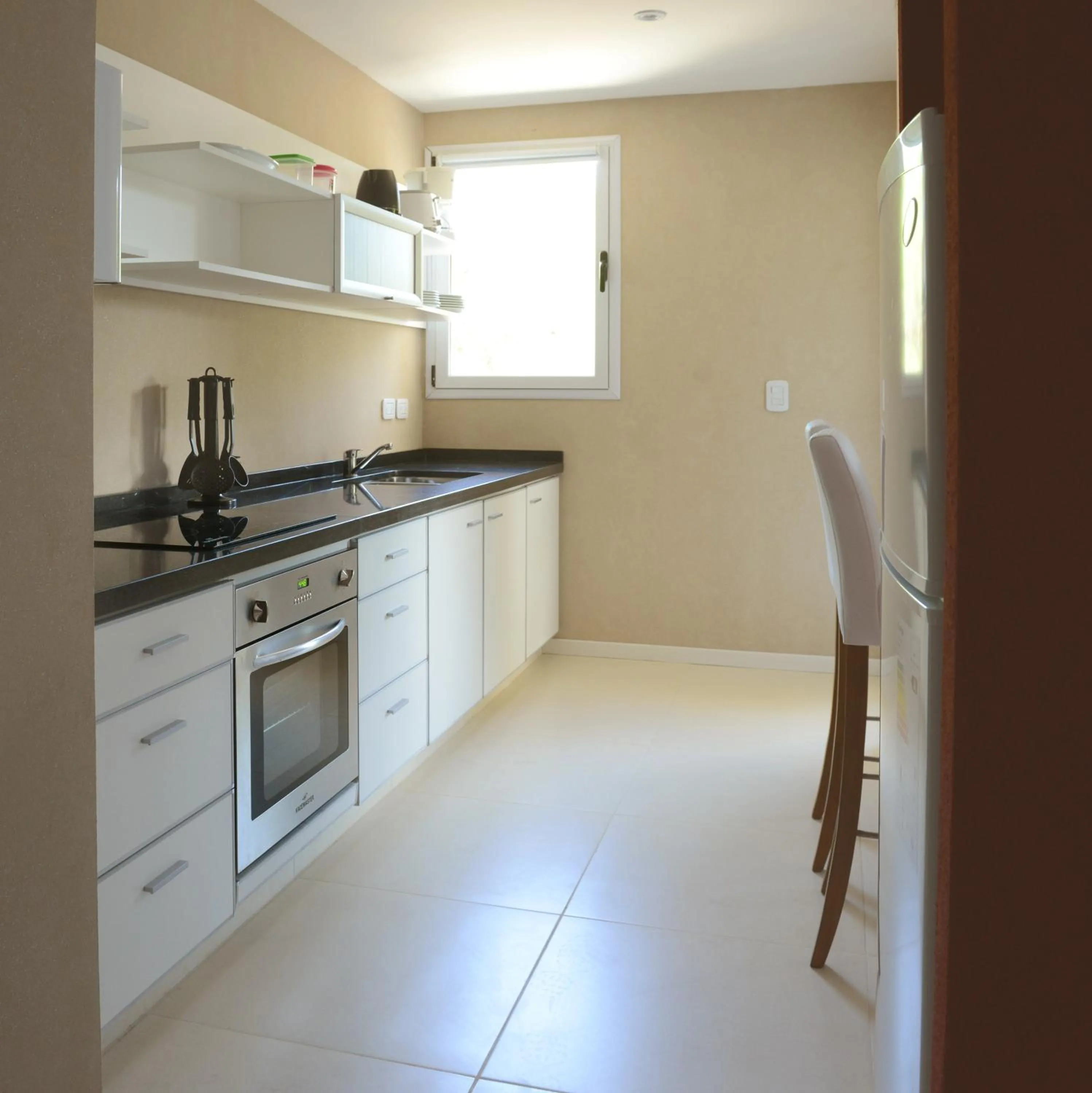 Kitchen or kitchenette in Suite House Carilo