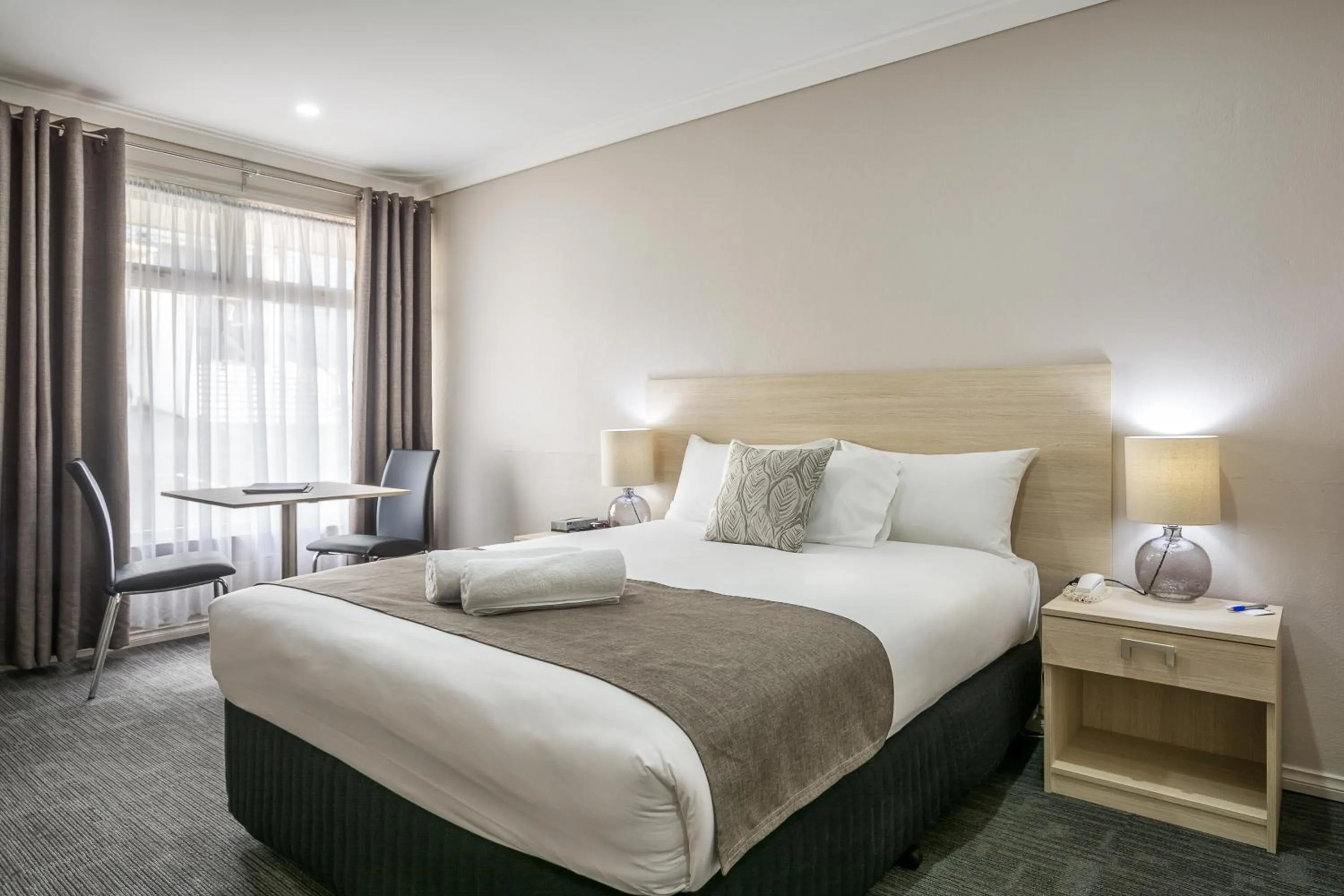 Toilet, Bed in Mandala Ace Albany Hotel