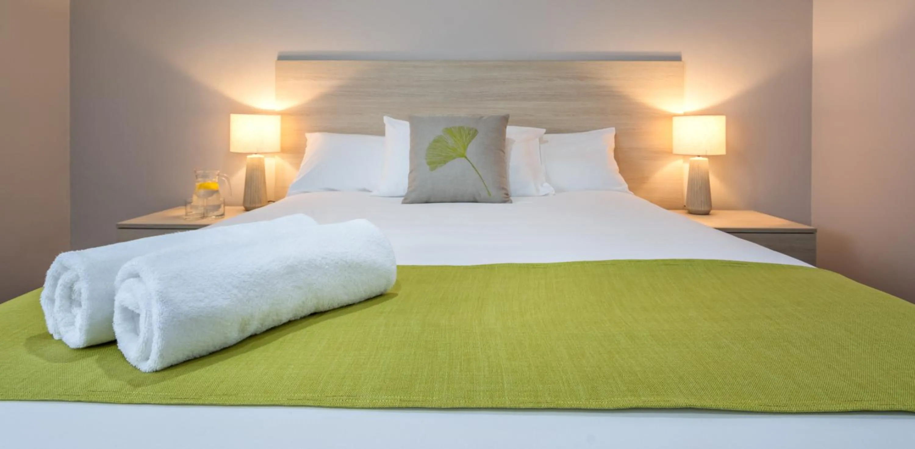 Bed in Mandala Ace Albany Hotel