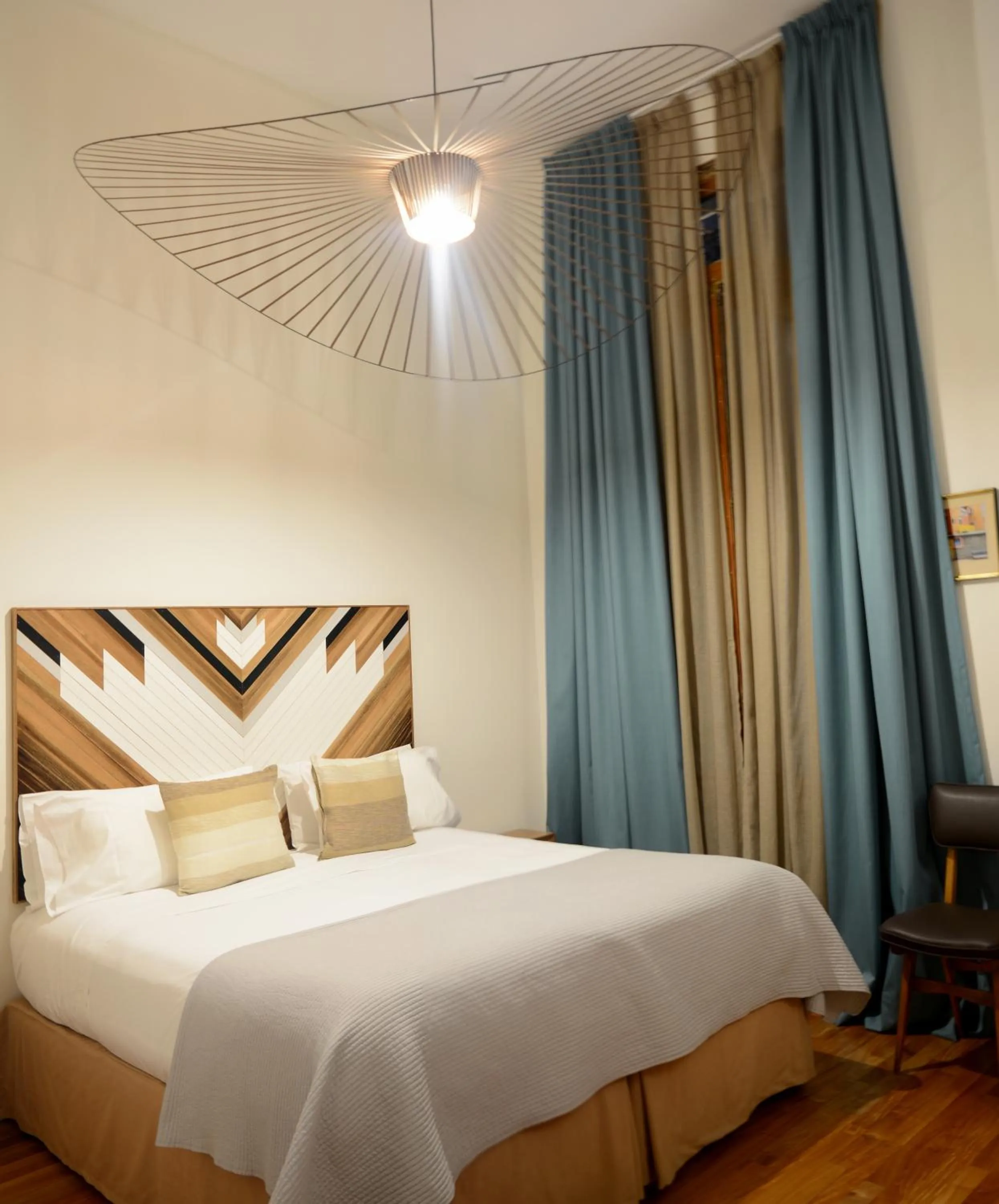 Bed in L'Adresse Hôtel Boutique