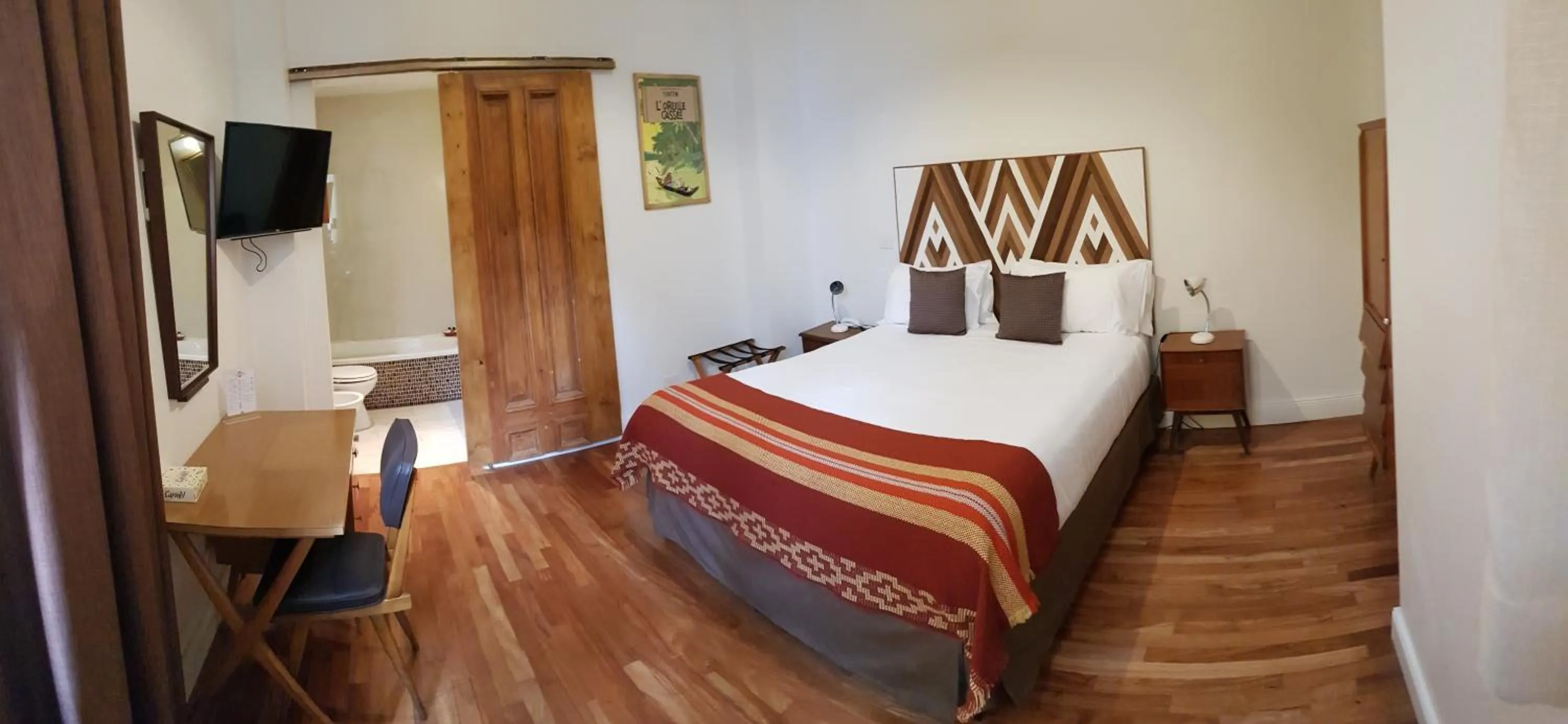 Bed in L'Adresse Hôtel Boutique