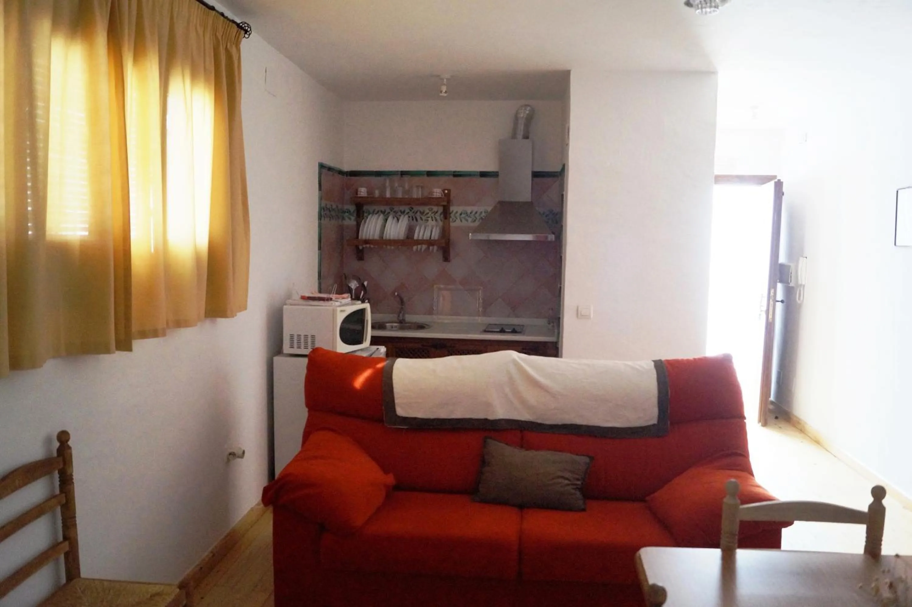 Living room, Bed in Casa de la Placeta del Rincón