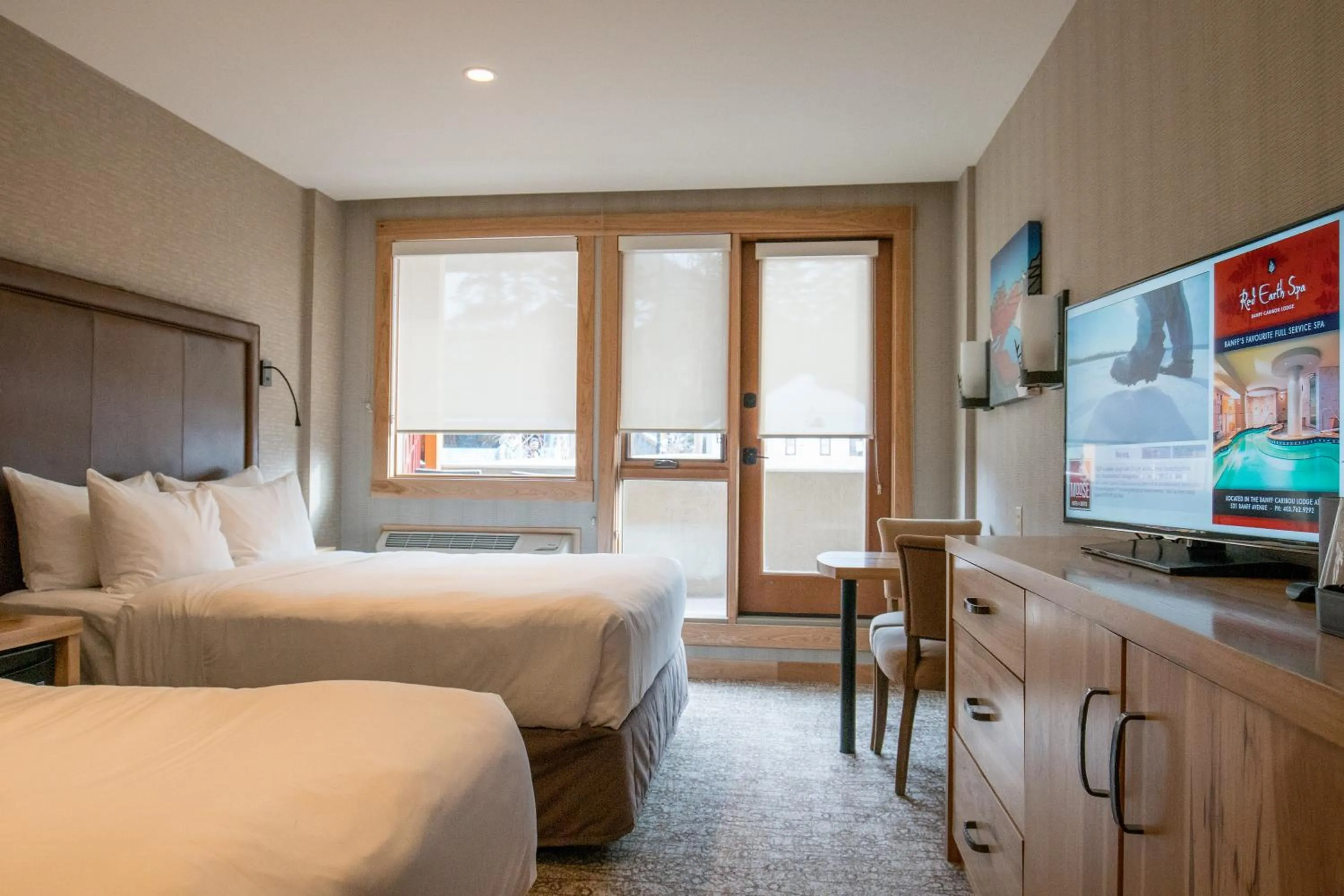 Photo of the whole room, Bed in Moose Hotel and Suites