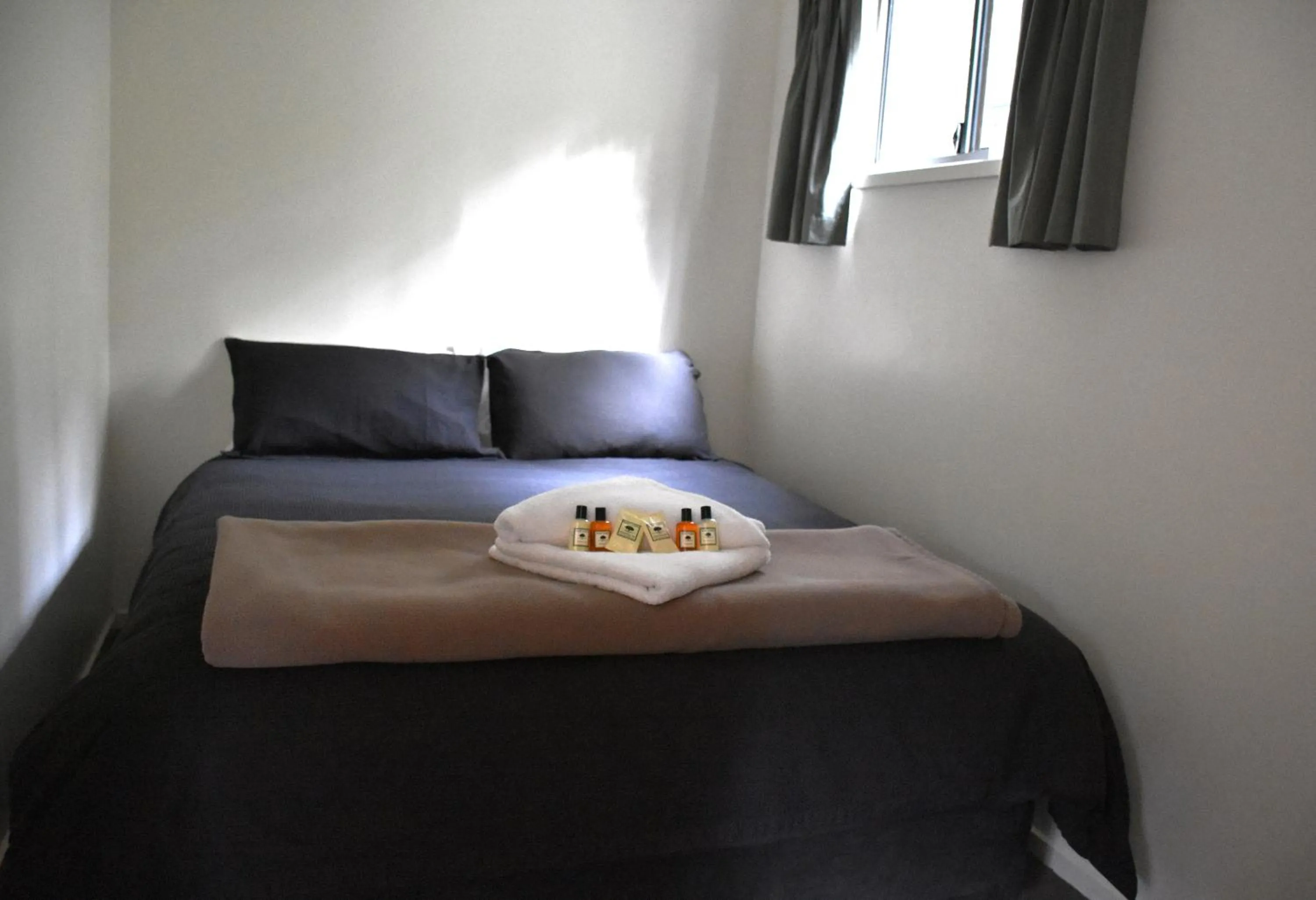 Bed in Tahune AirWalk Cabin and Lodge