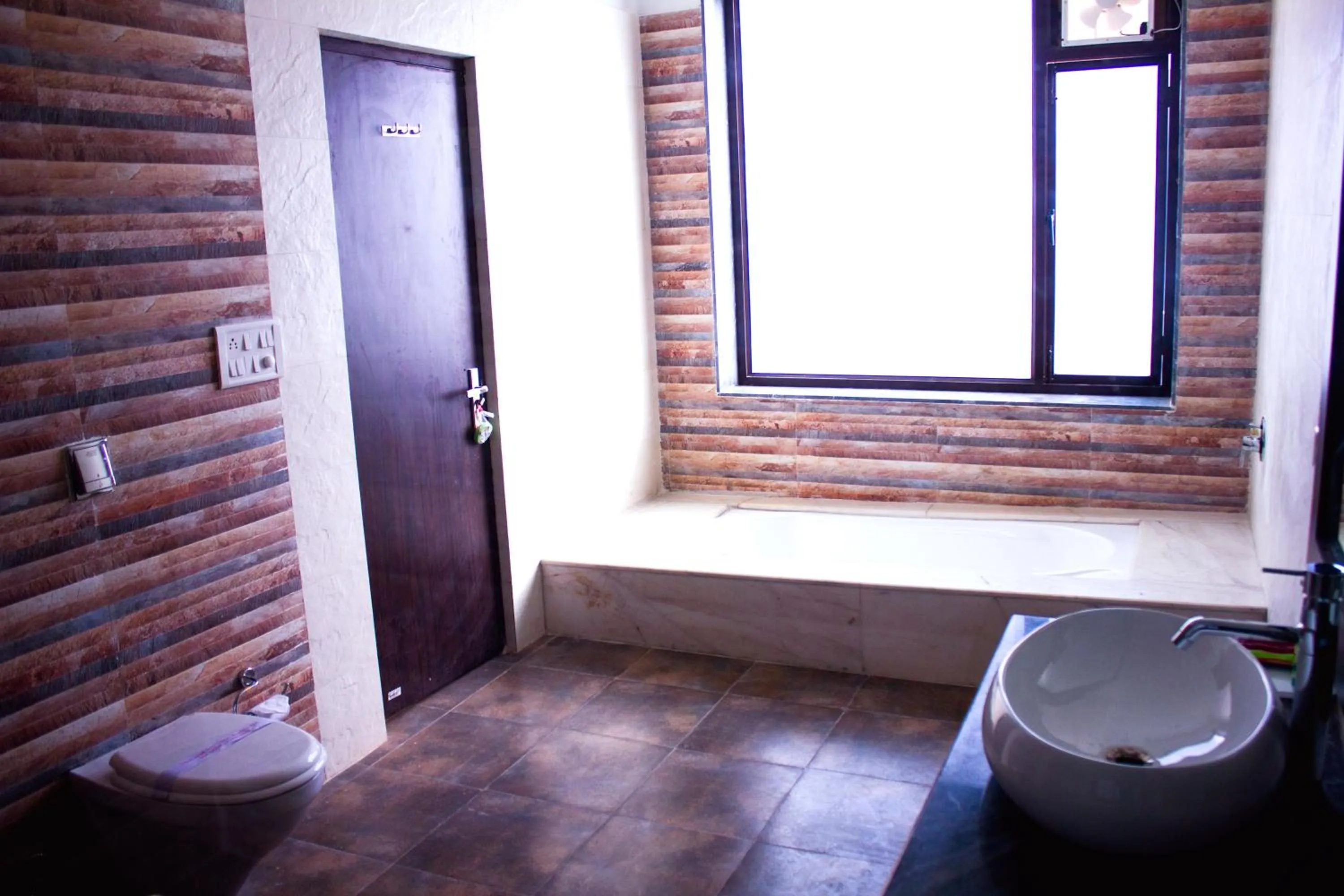 Toilet in Riverarch Greenfields Resort