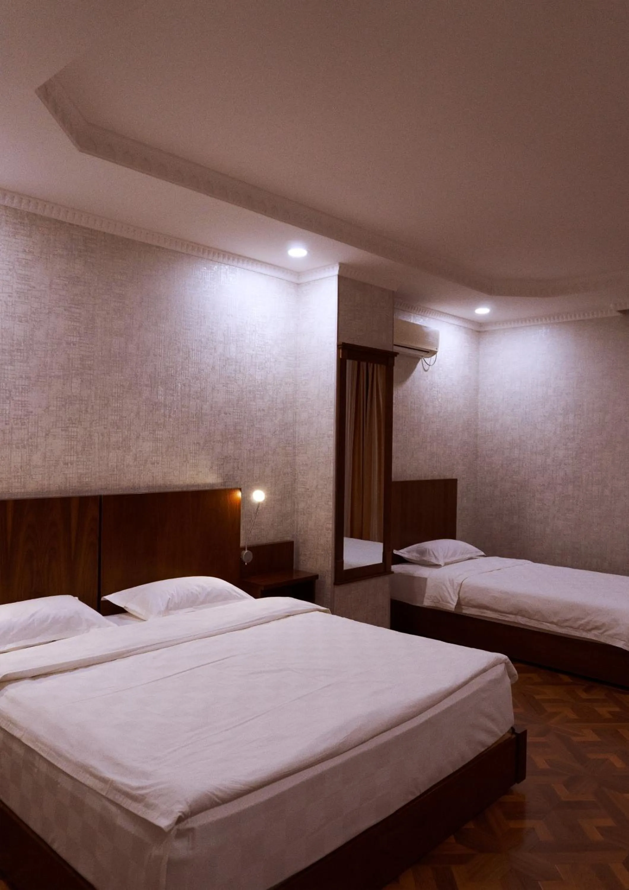 Bed in Omar Khayyam Hotel