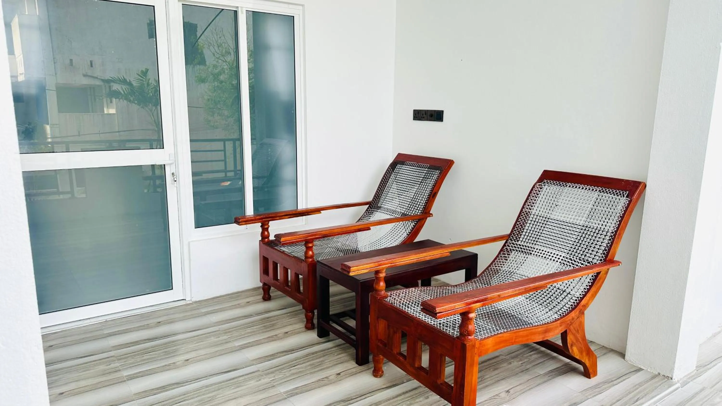 Seating area in Garden Beach Hotel
