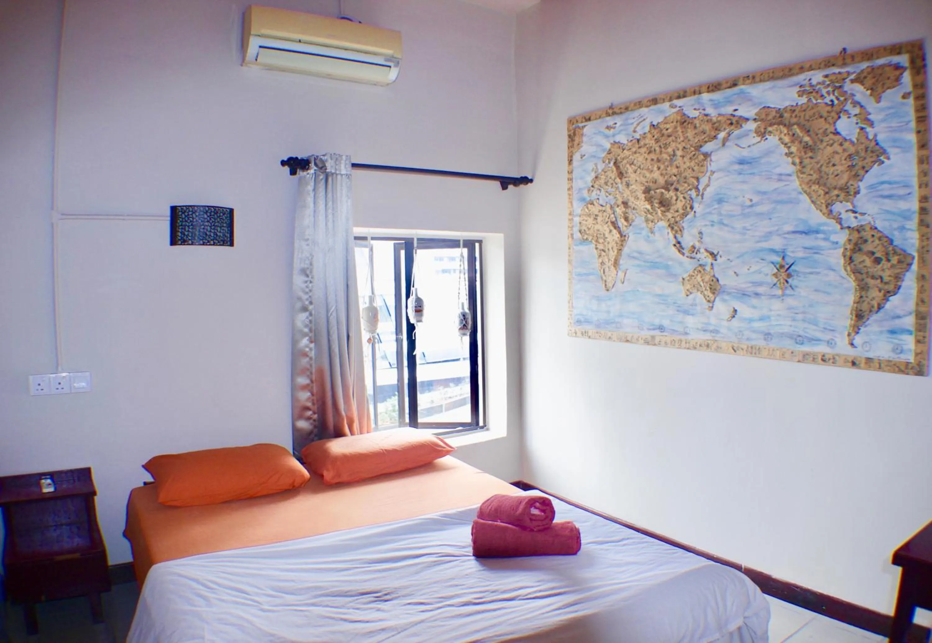 Bed in Birdnest Guesthouse, Gaia Rooftop Cafe