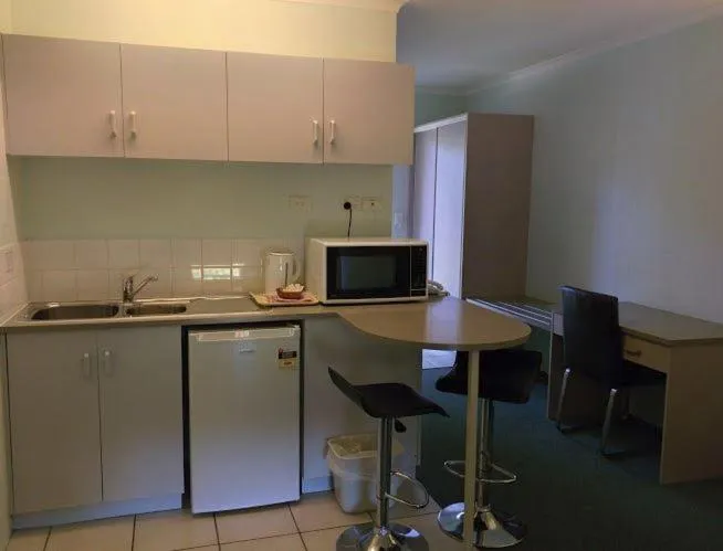 Kitchen or kitchenette in Alatai Holiday Apartments